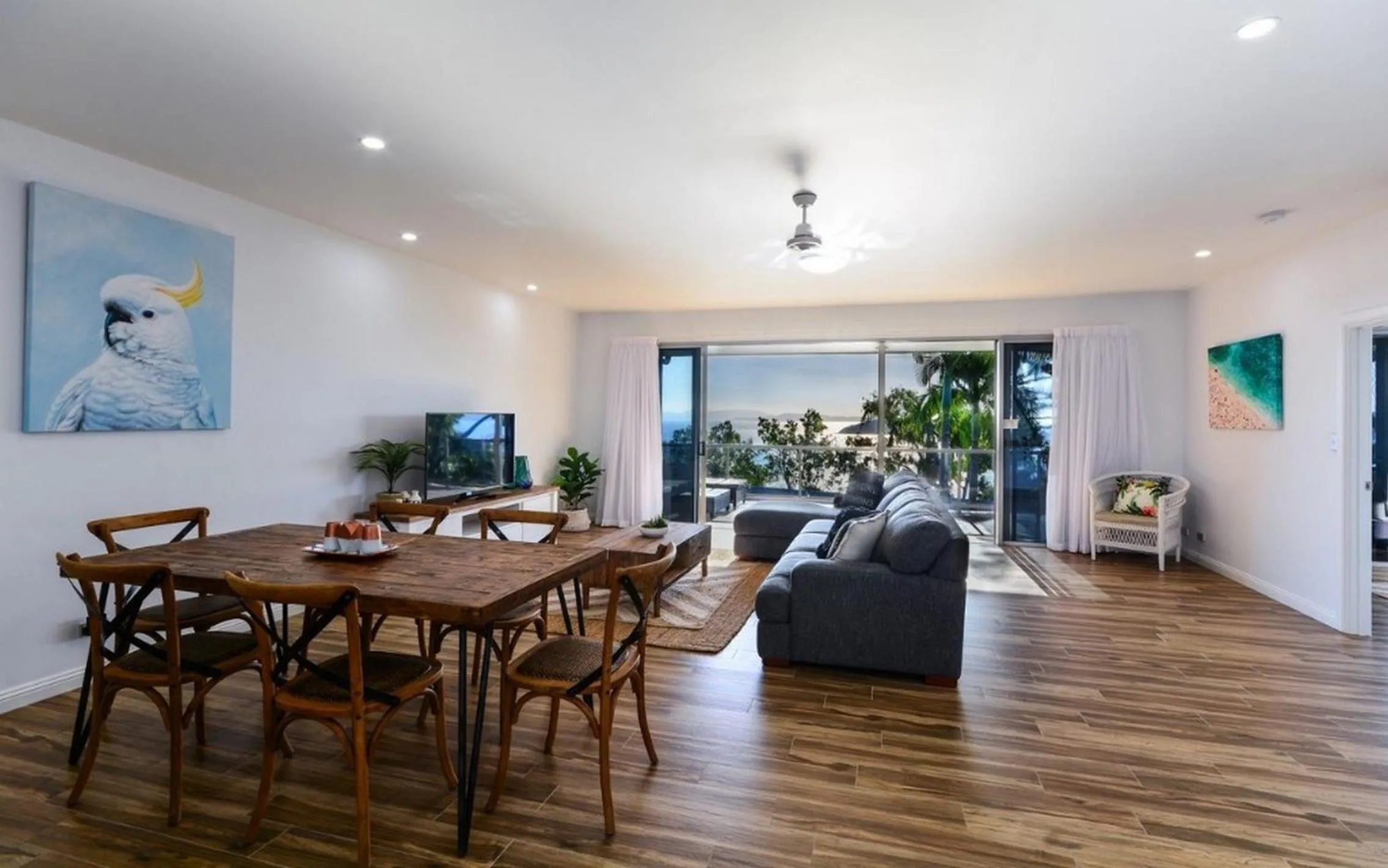 Living room in Blue Water Views on Hamilton Island by HIHA