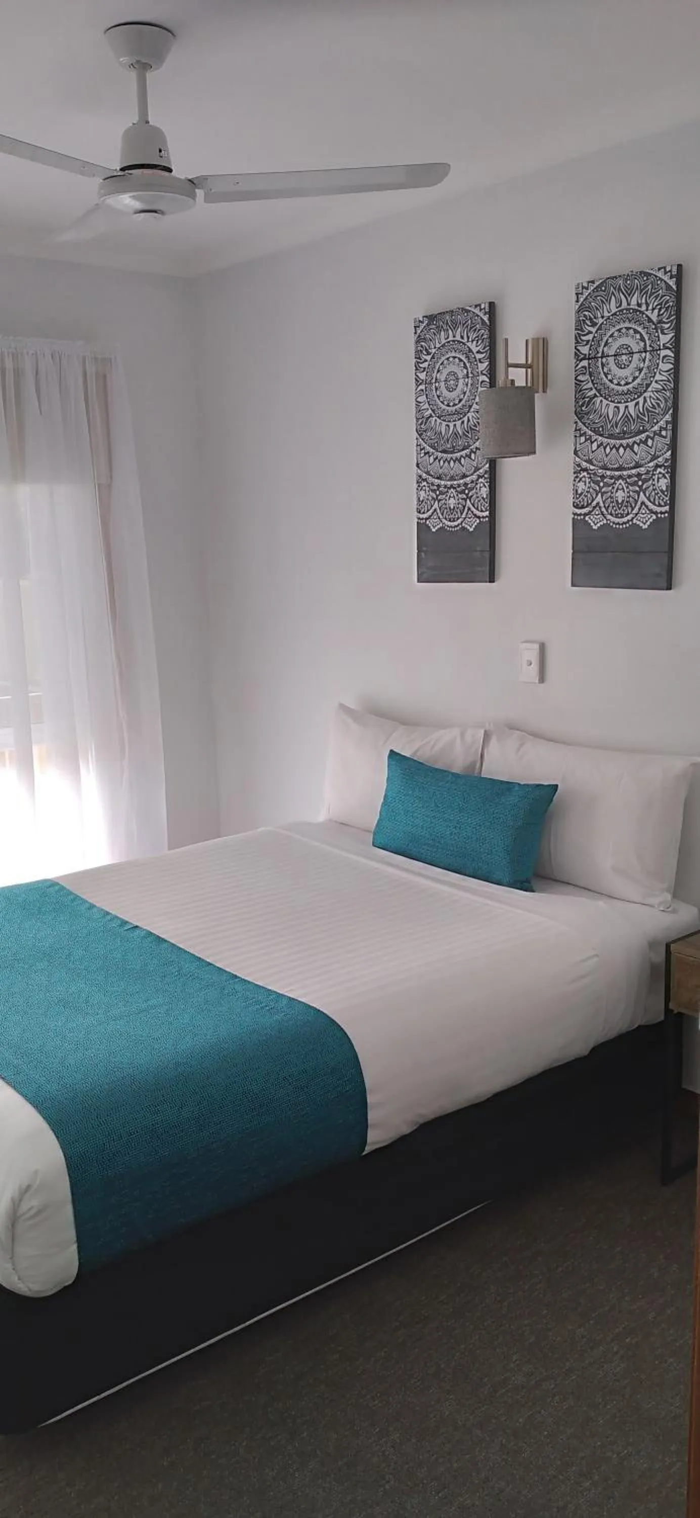 Bed in Centrepoint Motel Deniliquin