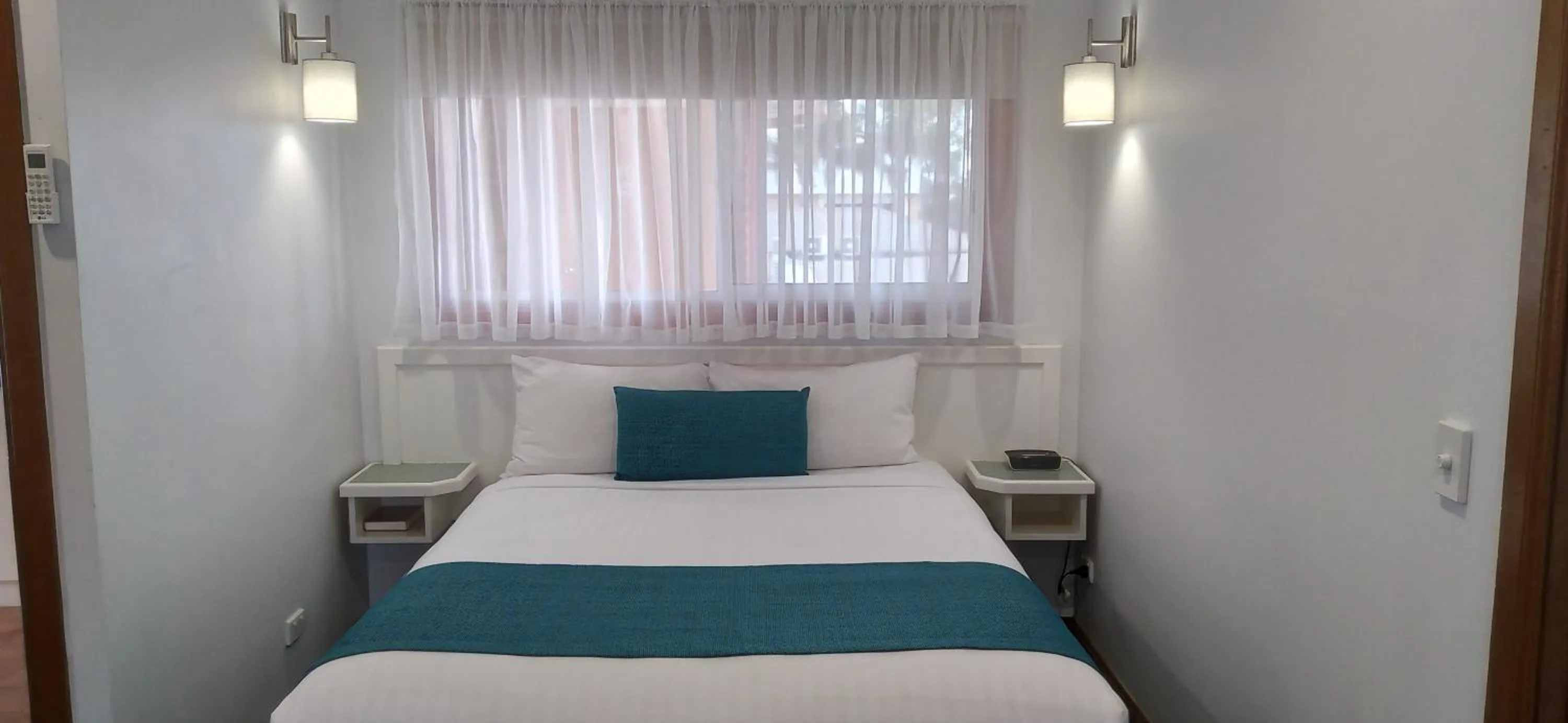 Bed in Centrepoint Motel Deniliquin