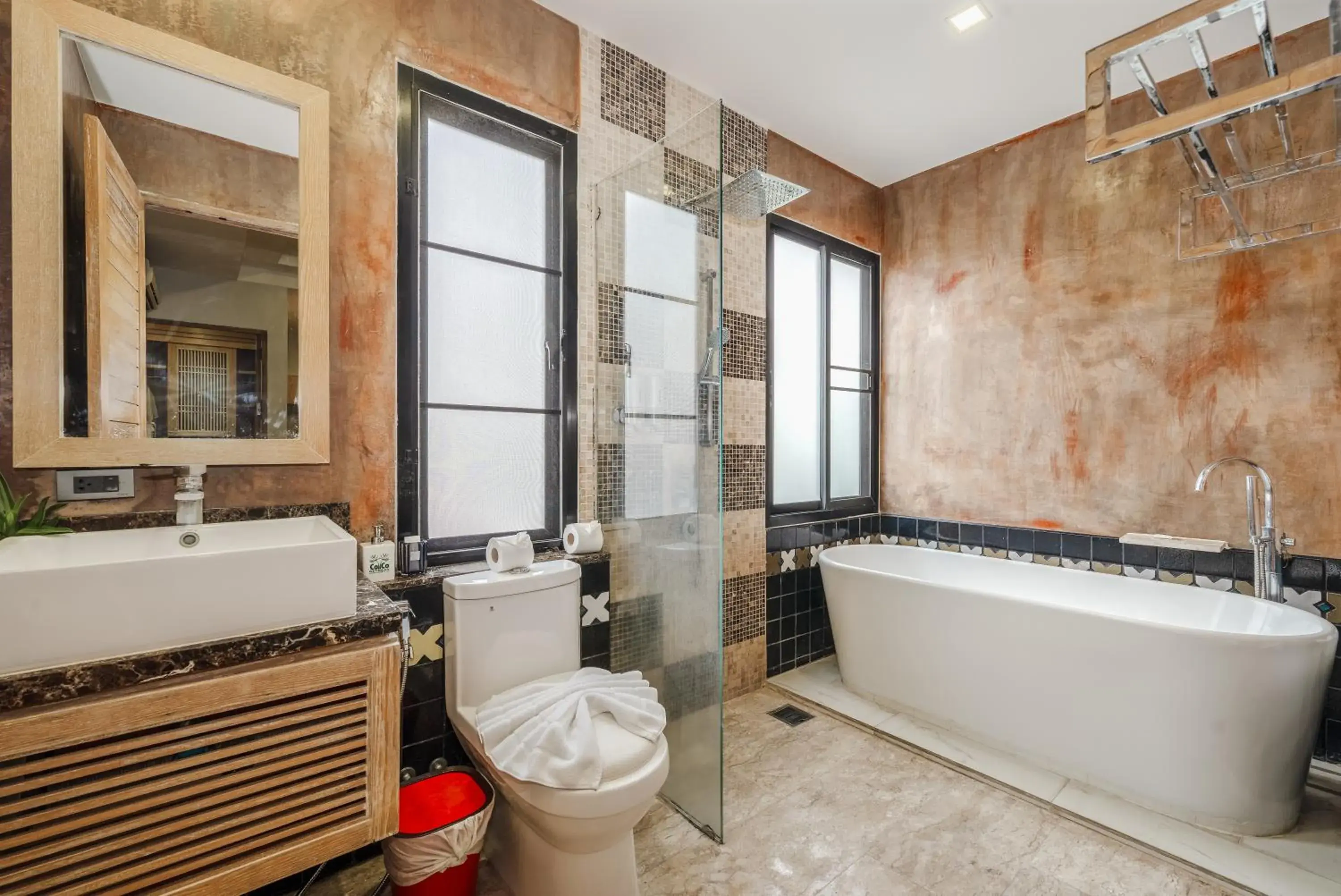 Bathroom in Coco Retreat Phuket Resort and Spa - SHA Plus Bathroom in Coco Retreat Phuket Resort and Spa - SHA Plus