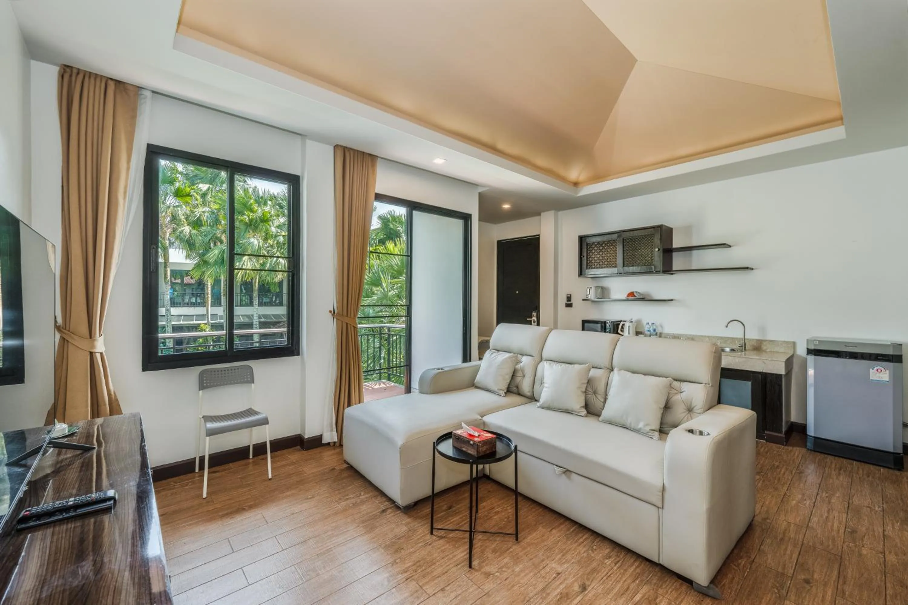 Living room in Coco Retreat Phuket Resort and Spa - SHA Plus