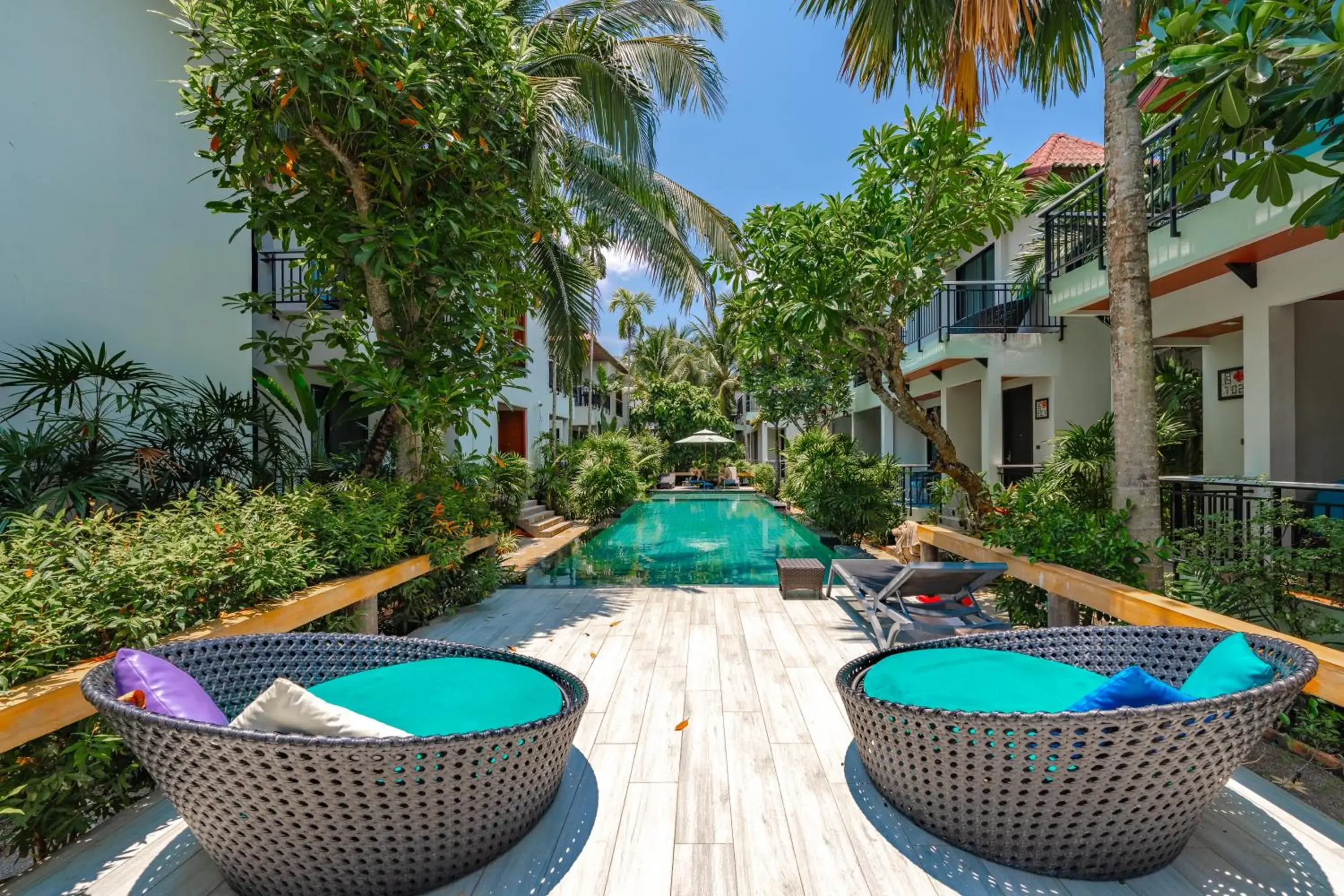 Swimming pool in Coco Retreat Phuket Resort and Spa - SHA Plus Swimming pool in Coco Retreat Phuket Resort and Spa - SHA Plus