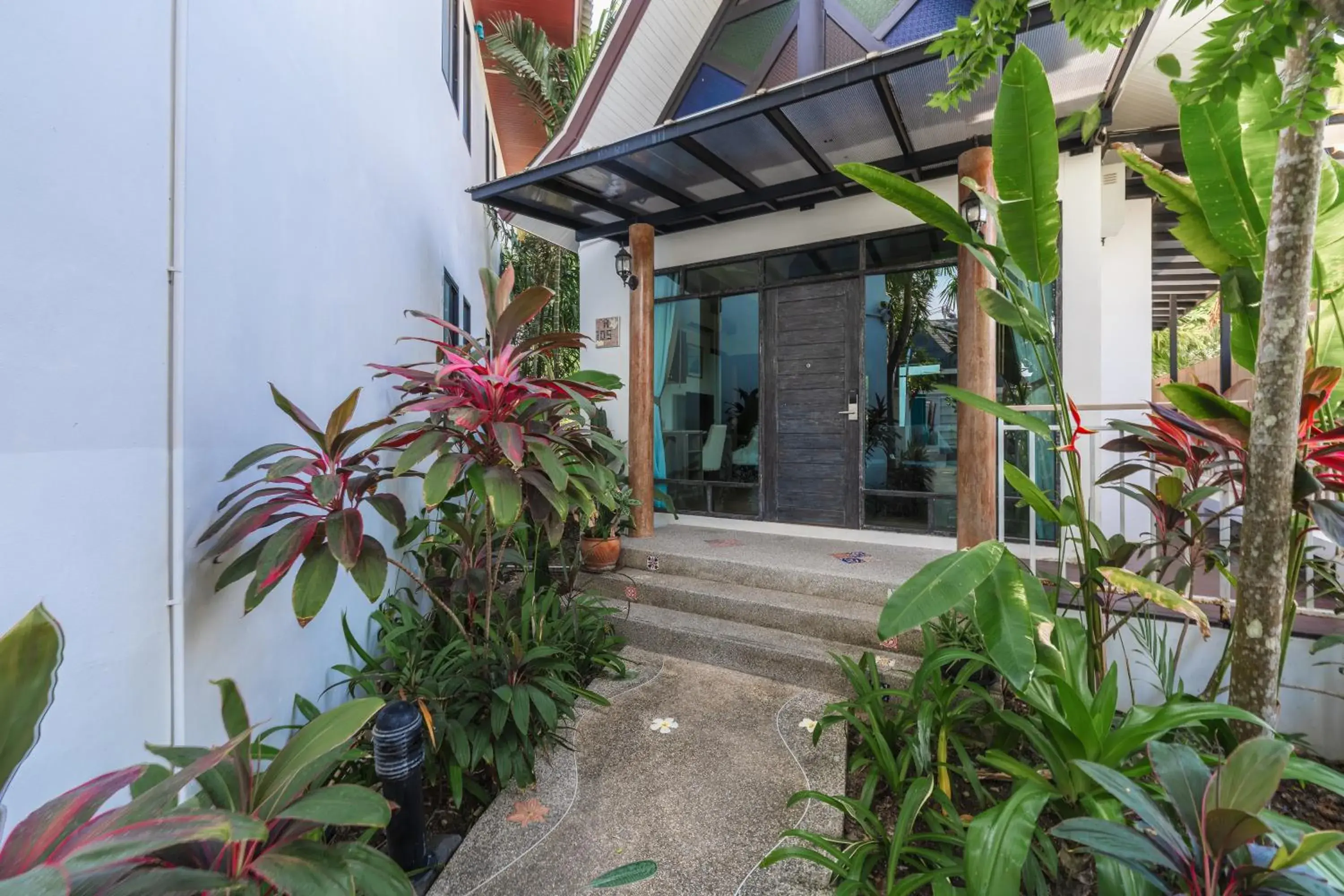 Property building in Coco Retreat Phuket Resort and Spa - SHA Plus Property building in Coco Retreat Phuket Resort and Spa - SHA Plus