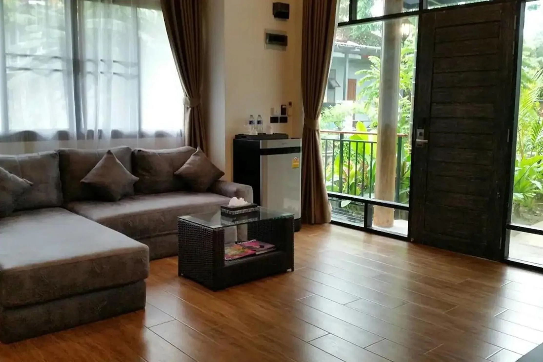 Living room in Coco Retreat Phuket Resort and Spa - SHA Plus