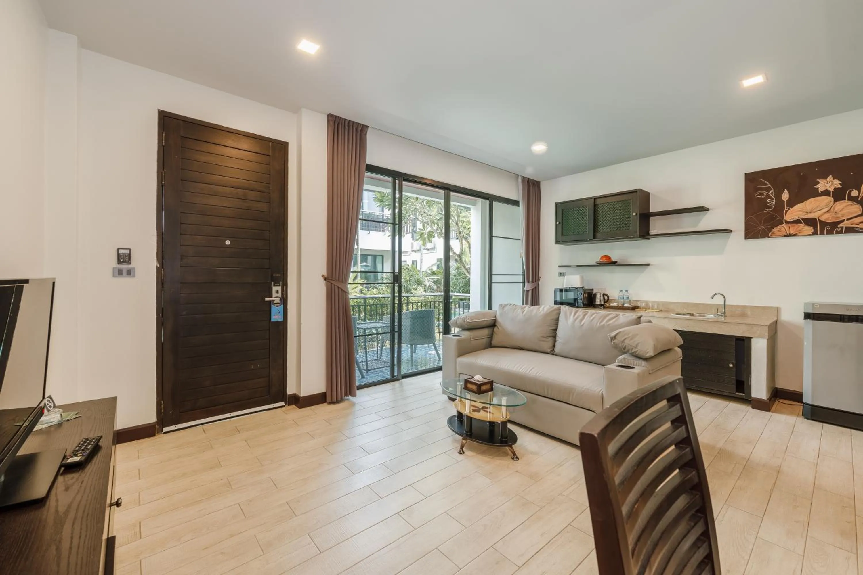 Living room in Coco Retreat Phuket Resort and Spa - SHA Plus