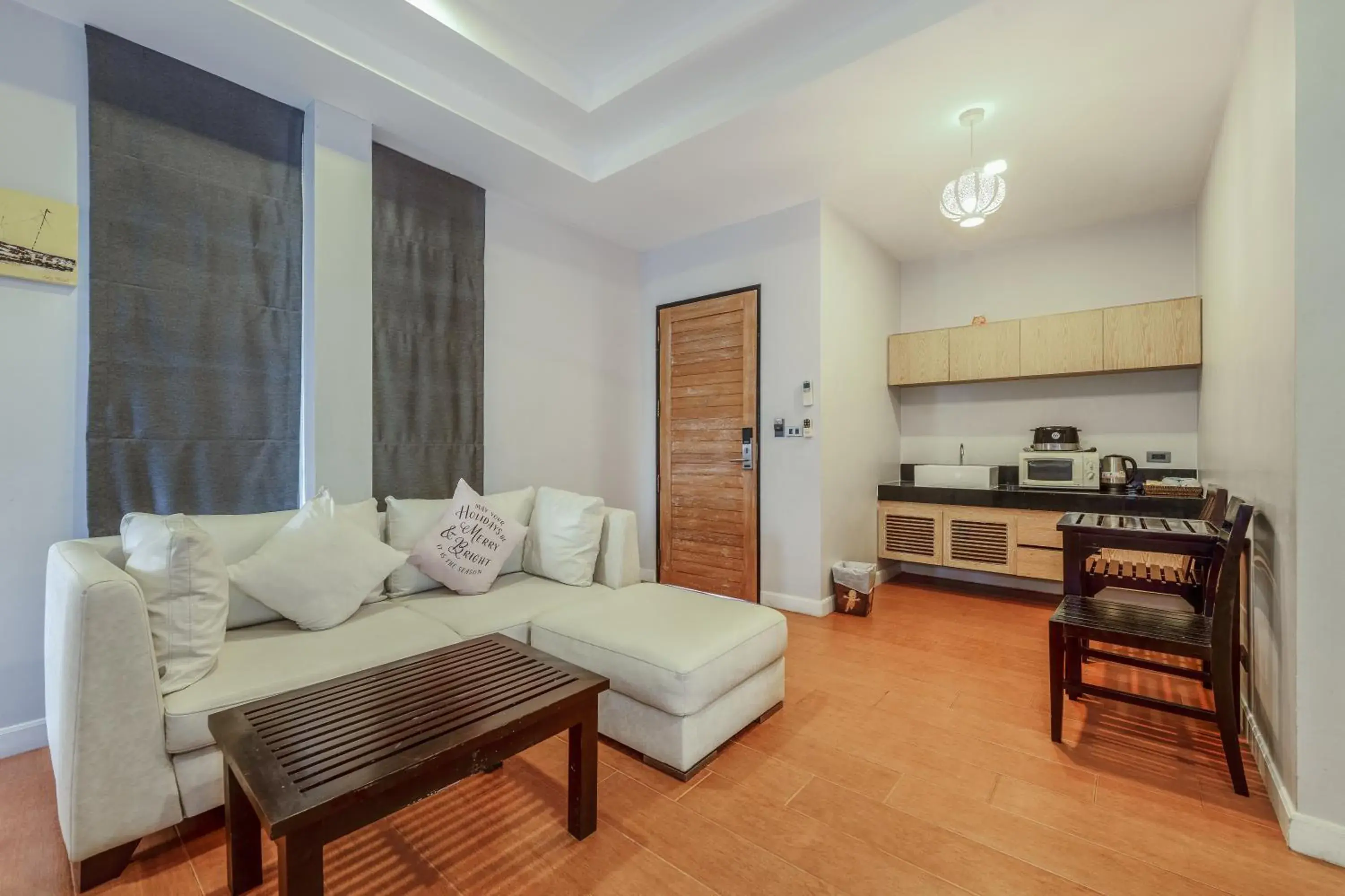 Living room in Coco Retreat Phuket Resort and Spa - SHA Plus Living room in Coco Retreat Phuket Resort and Spa - SHA Plus