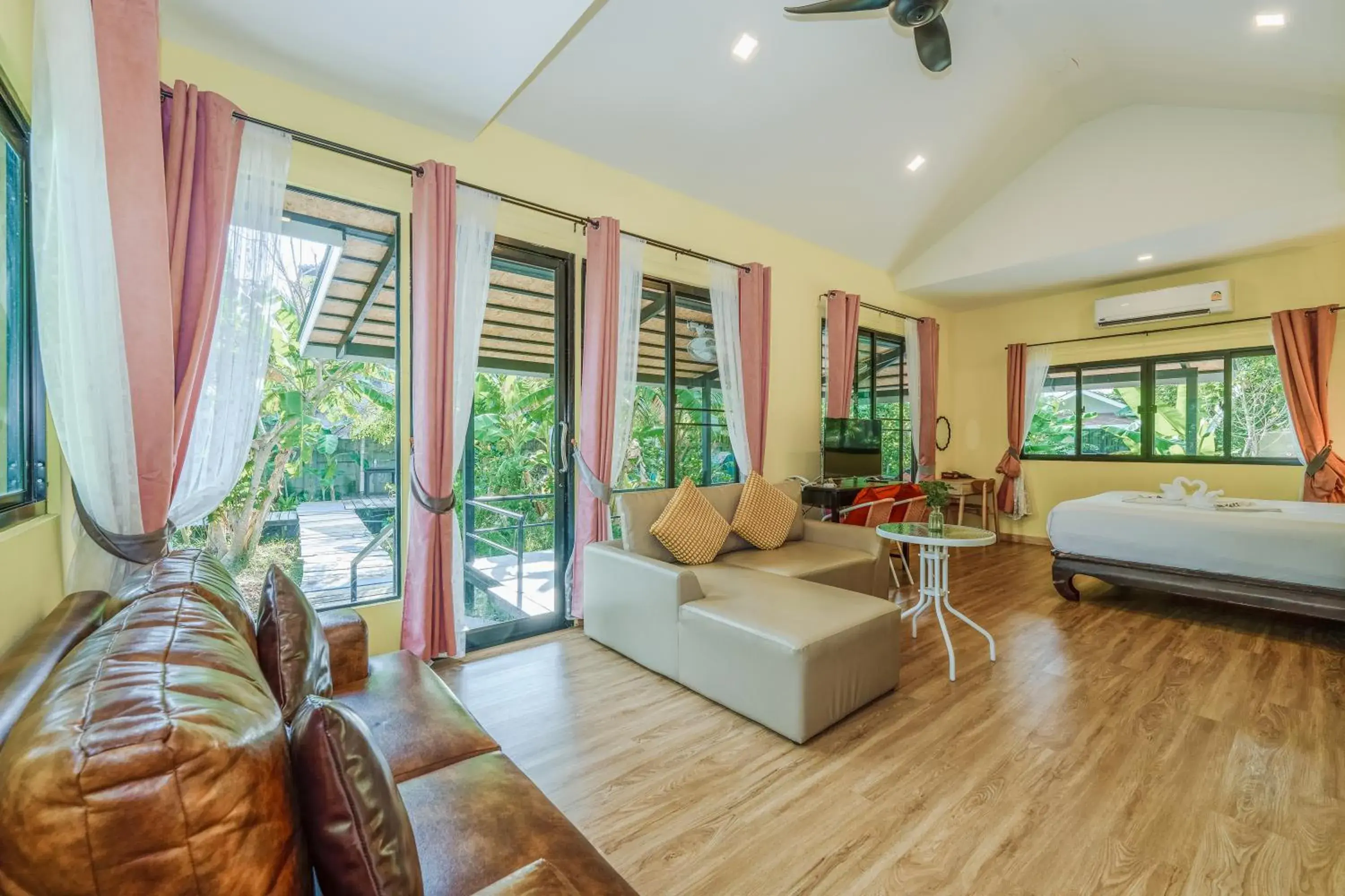 Living room, Bed in Coco Retreat Phuket Resort and Spa - SHA Plus Living room, Bed in Coco Retreat Phuket Resort and Spa - SHA Plus