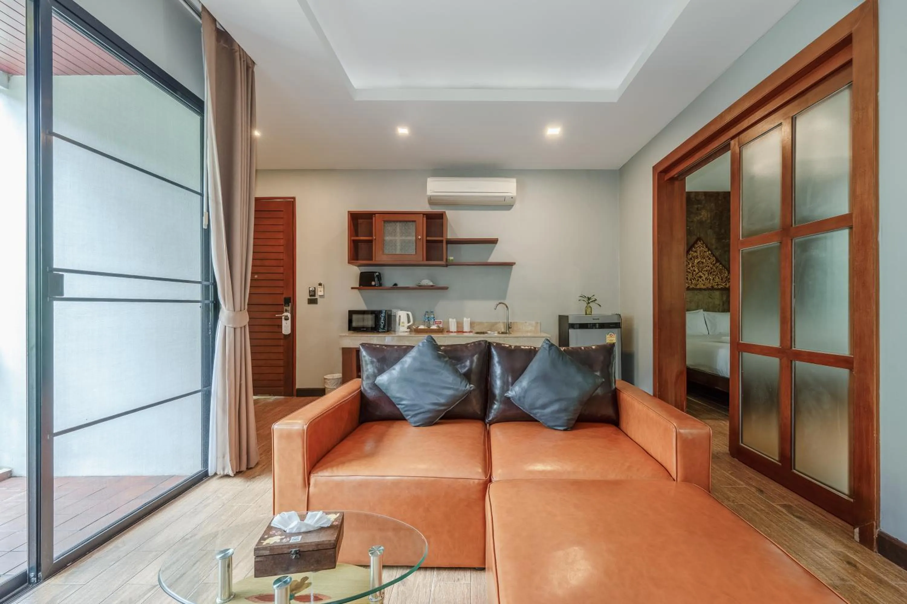 Living room in Coco Retreat Phuket Resort and Spa - SHA Plus