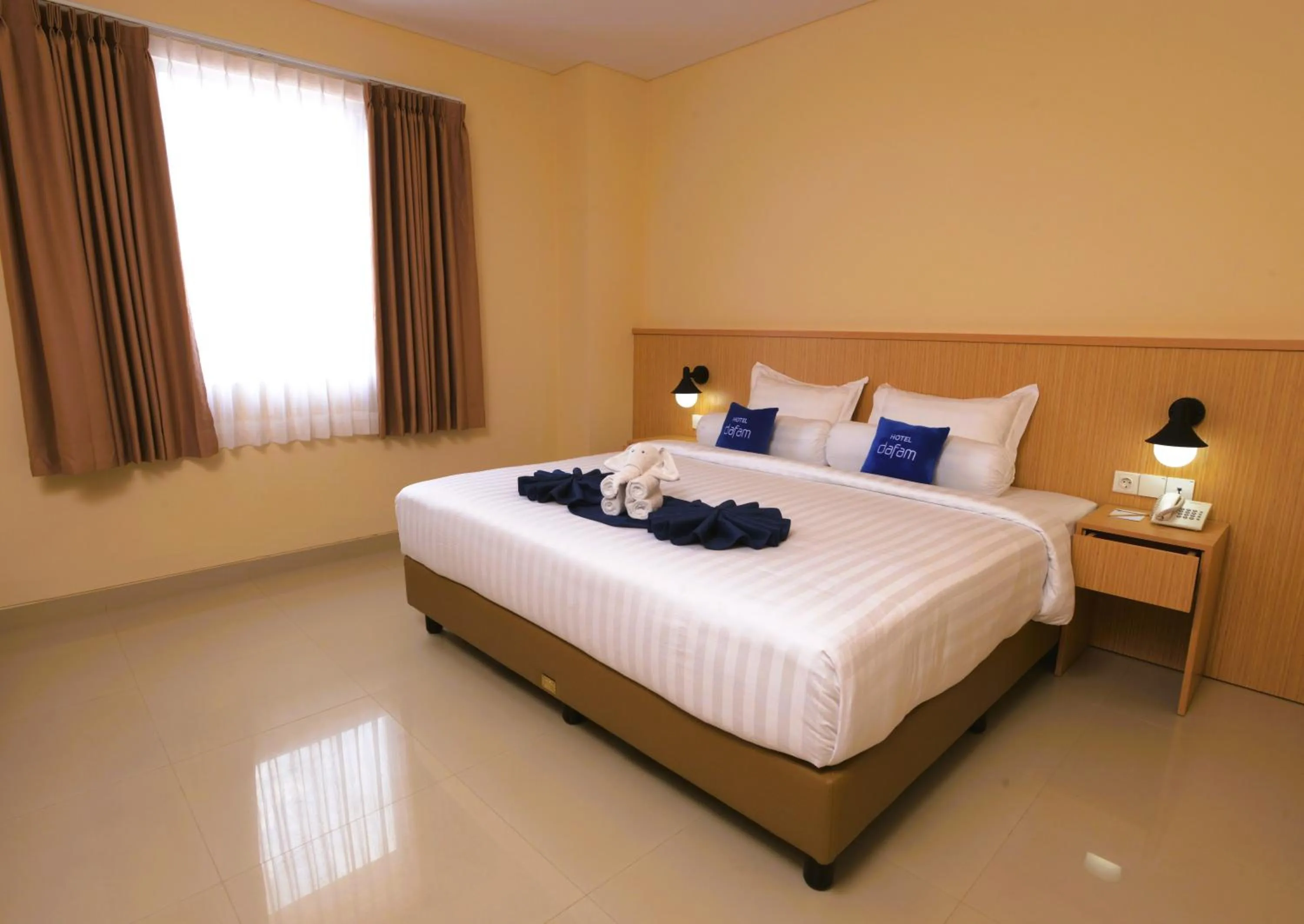 Photo of the whole room, Bed in Hotel Dafam Rio