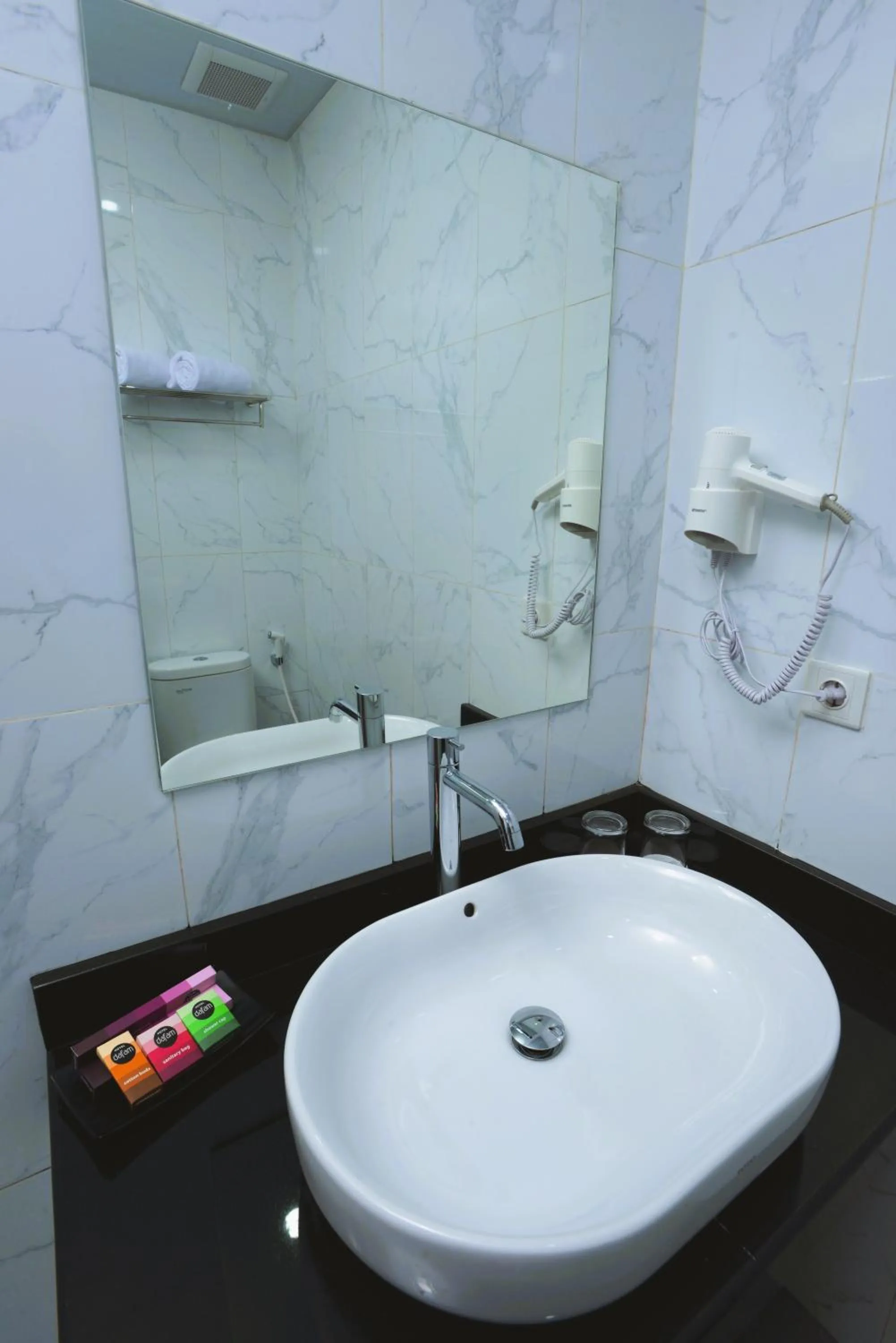 Bathroom in Hotel Dafam Rio