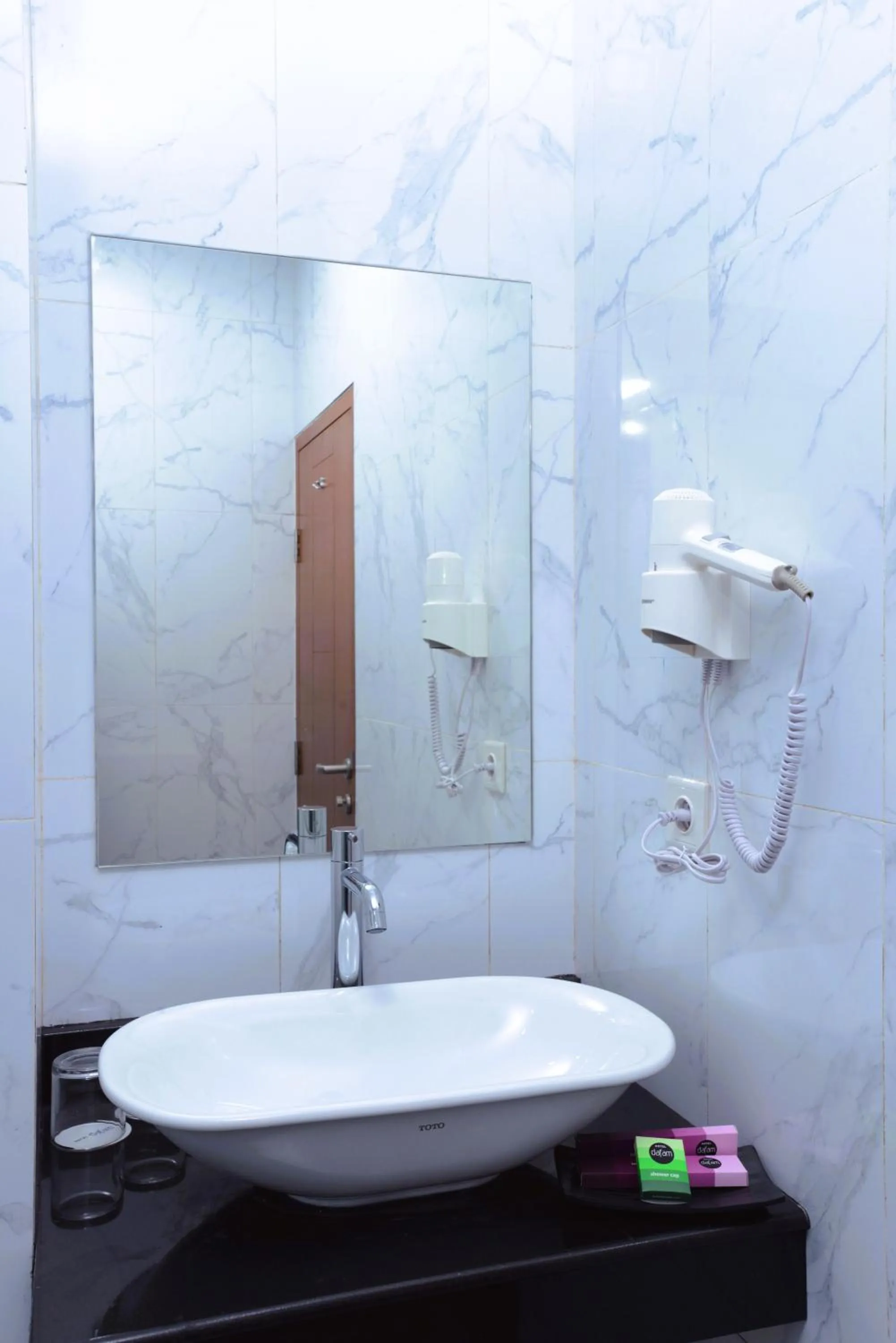 Bathroom in Hotel Dafam Rio