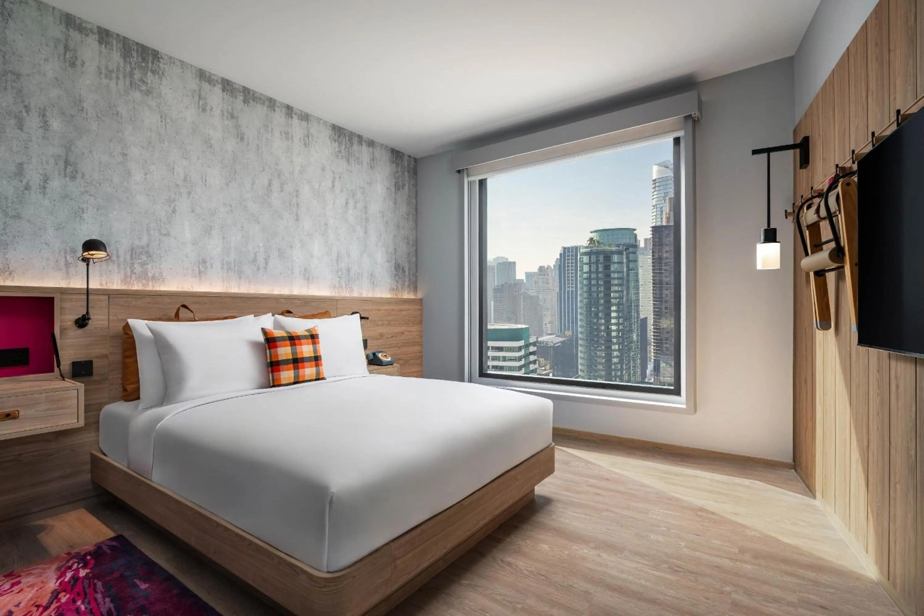 Photo of the whole room, Bed in Moxy Bangkok Ratchaprasong