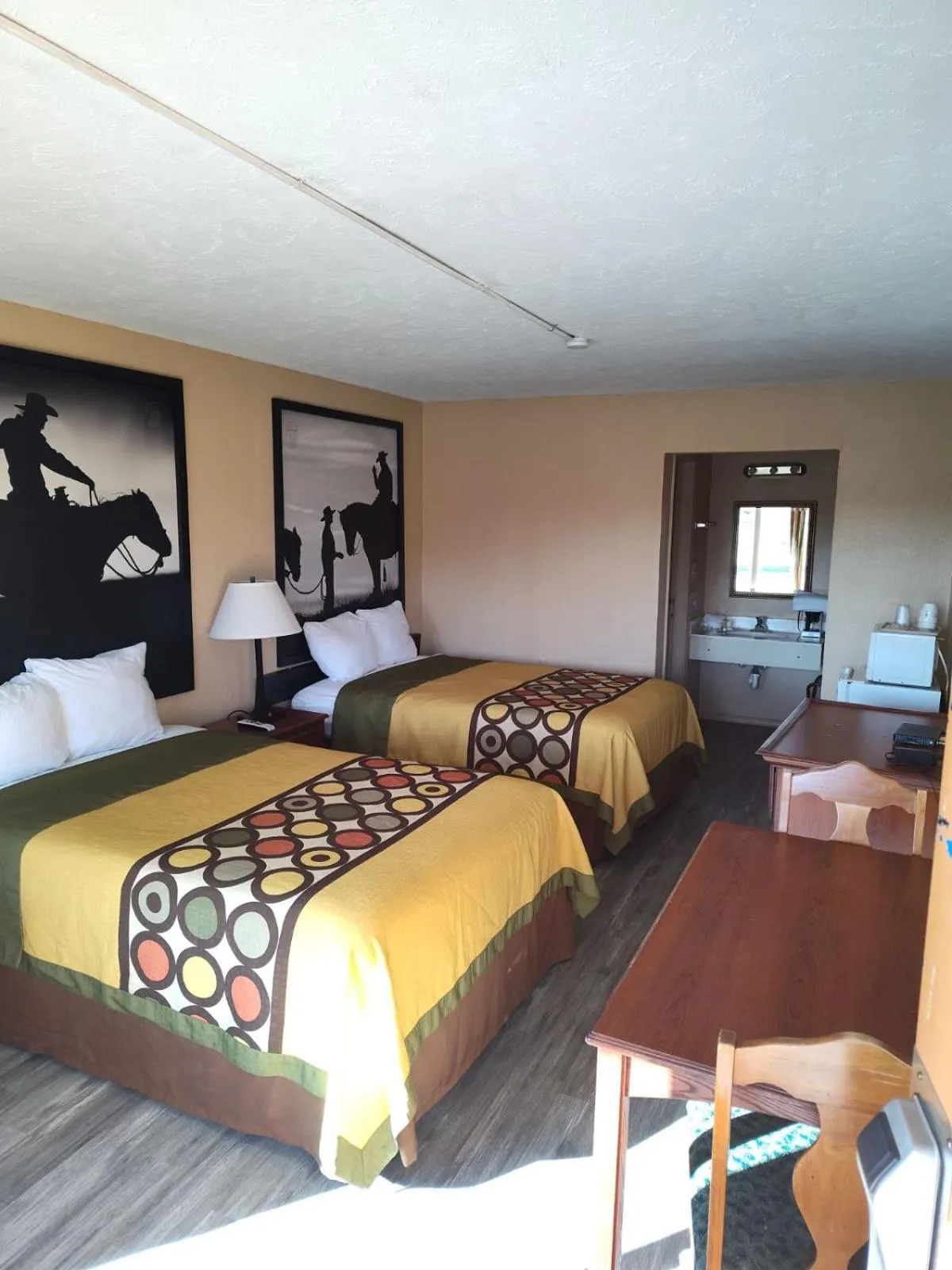 Bed in Arya Inn & Extended Stay