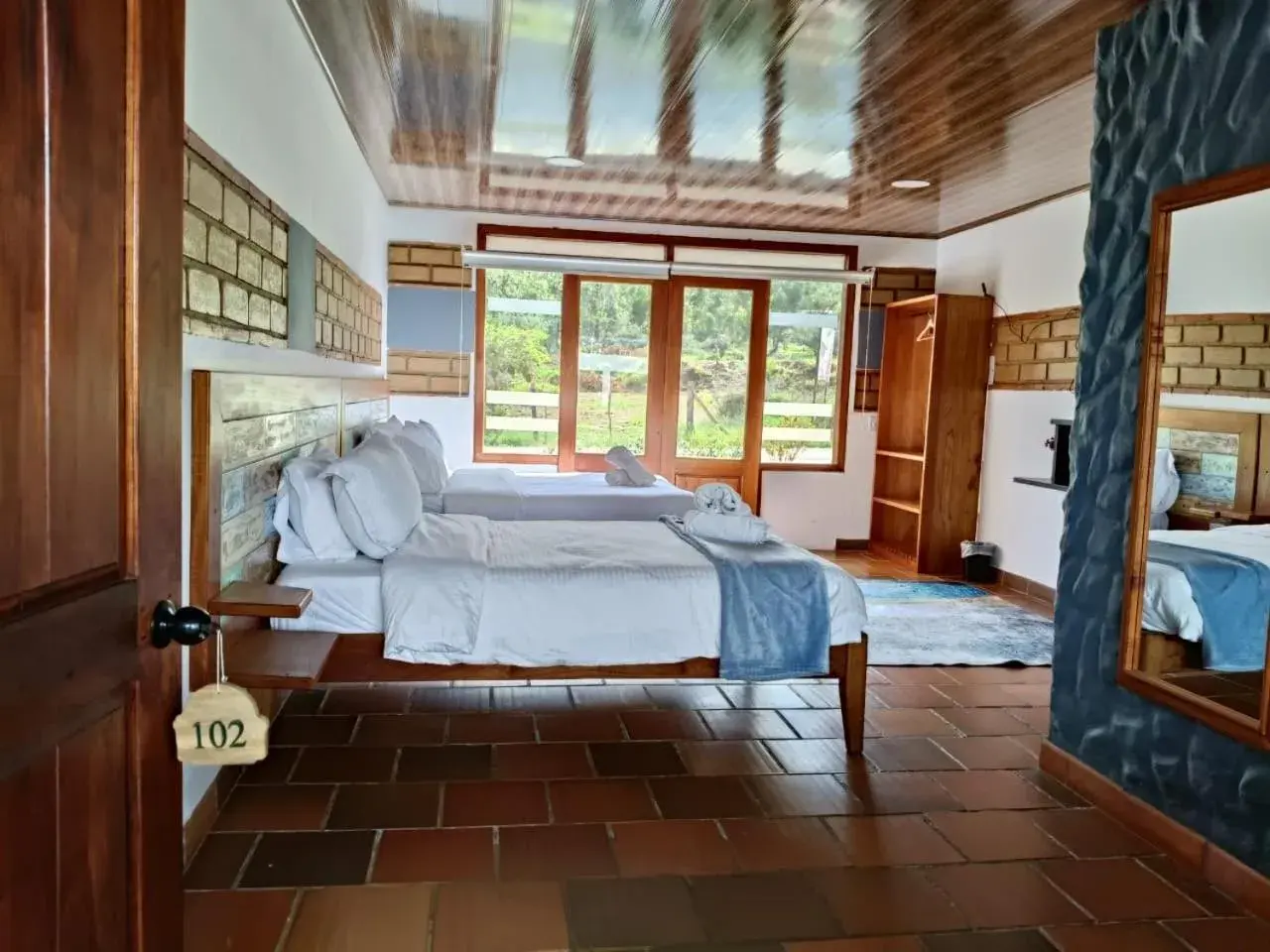 Triple Room with Garden View in Hotel Pliosaurio Campestre Triple Room with Garden View in Hotel Pliosaurio Campestre
