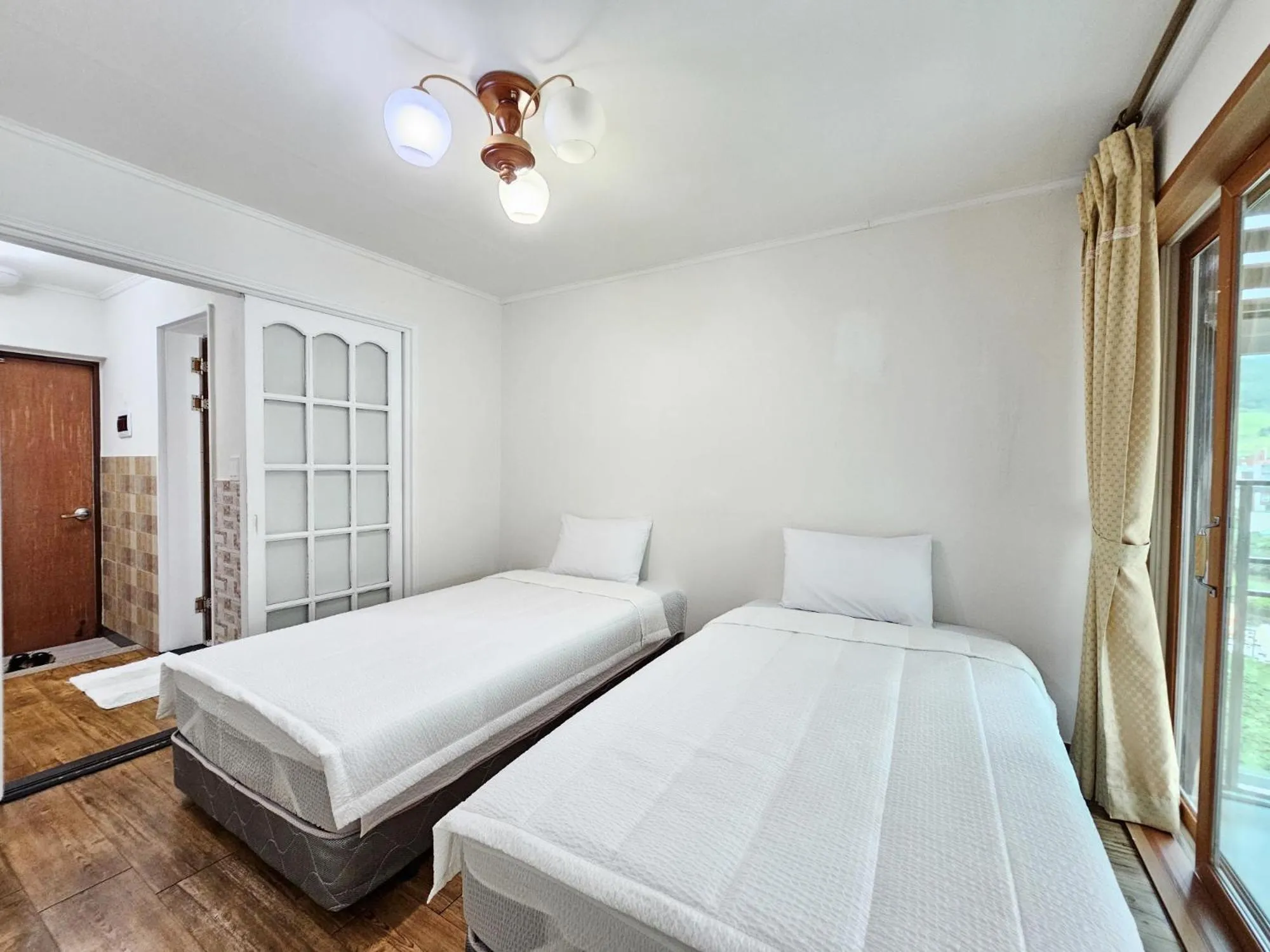 Bed in Seongsan Sunrise Pension