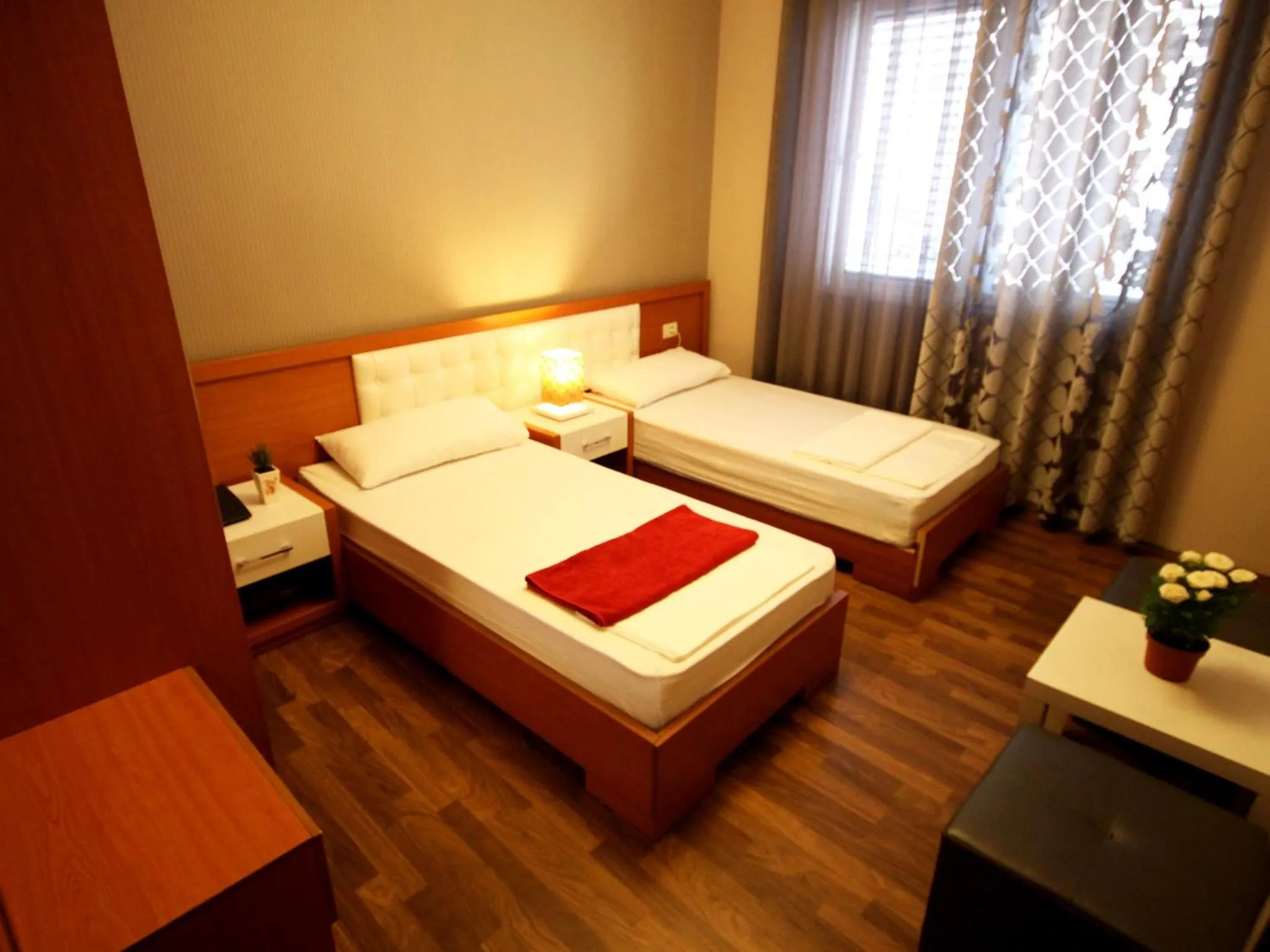 Toilet, Bed in Hotel Bylis