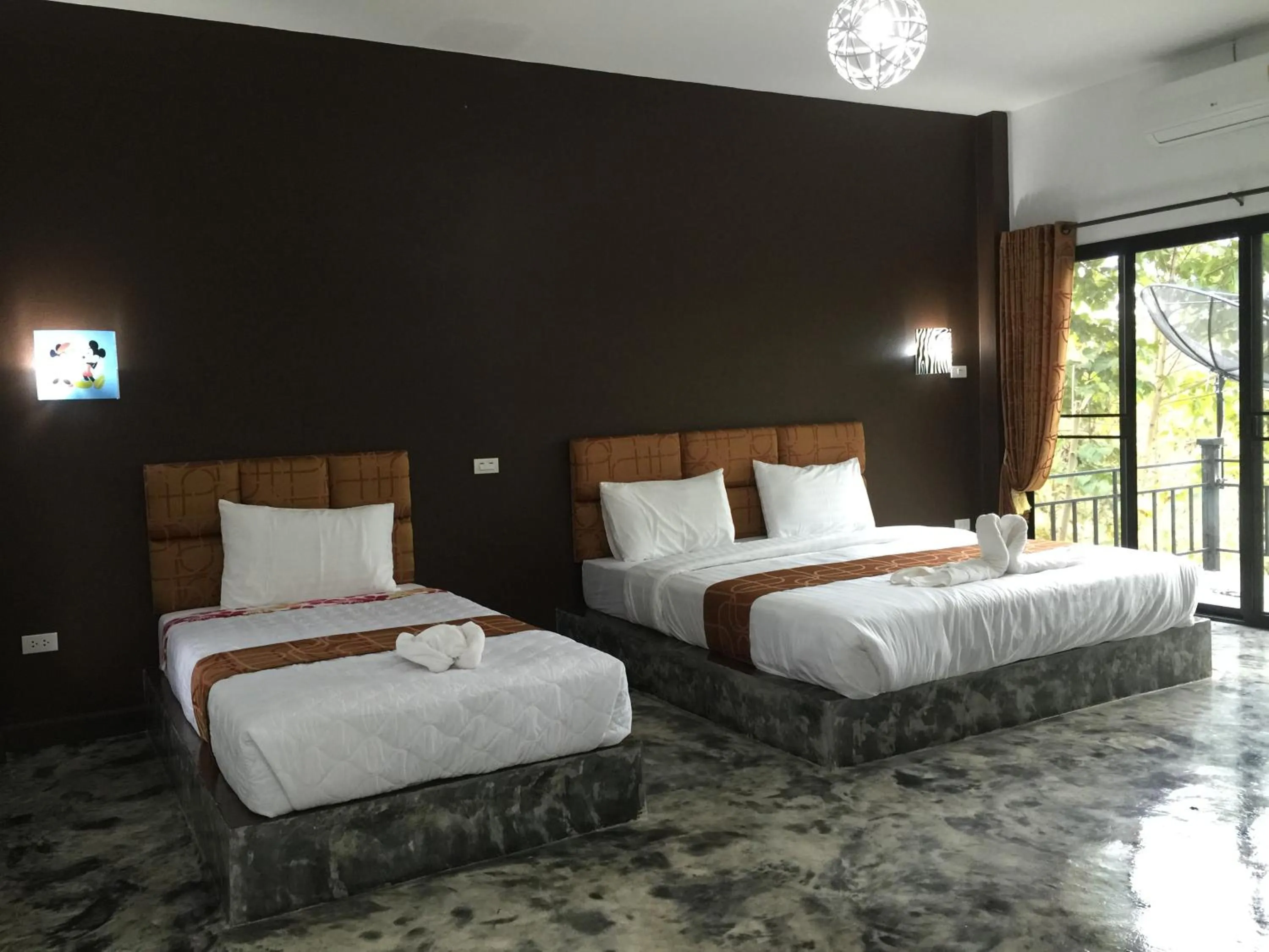 Bed in Baan Rai Phufah Resort Chiangrai