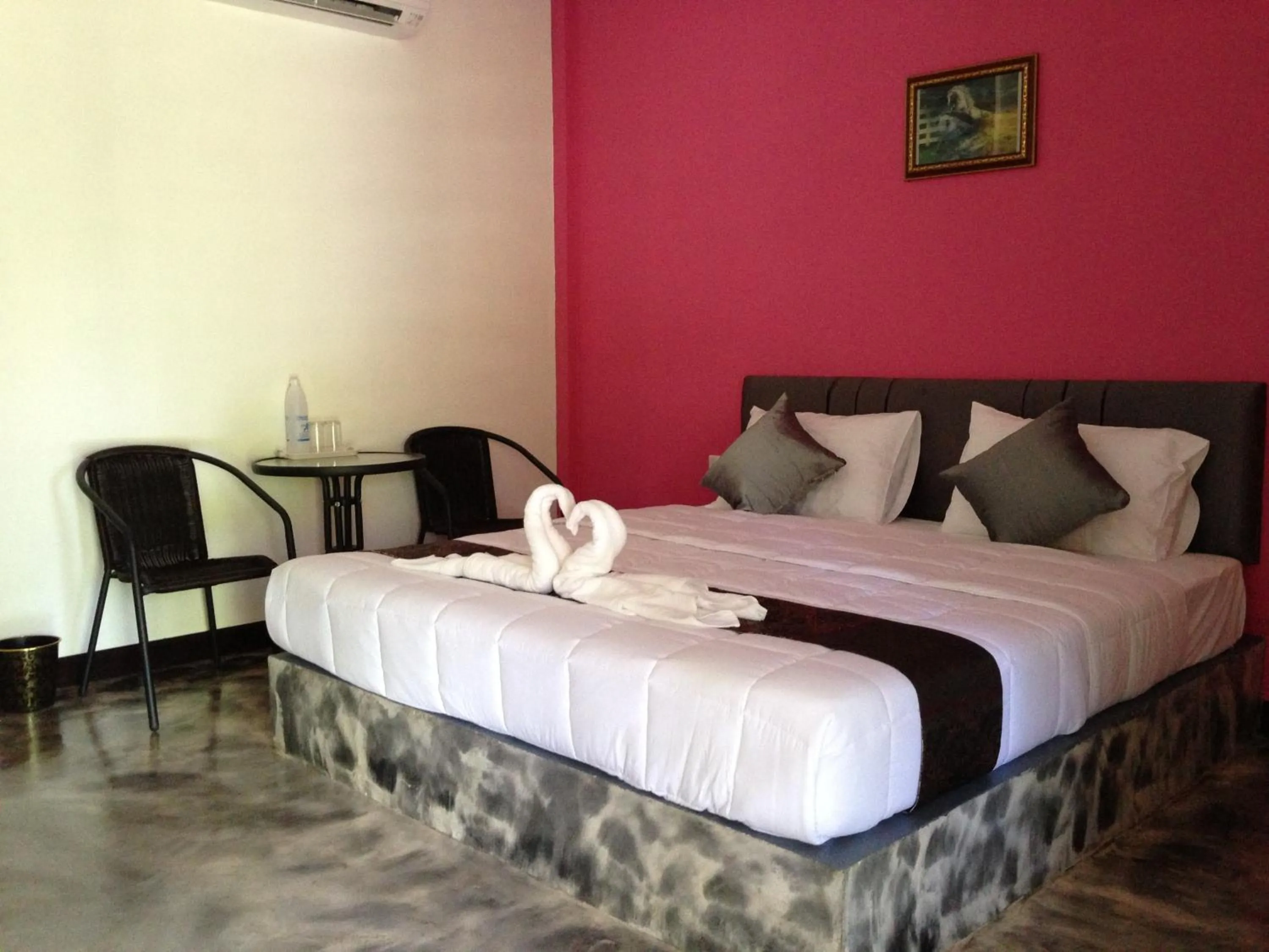 Bed in Baan Rai Phufah Resort Chiangrai