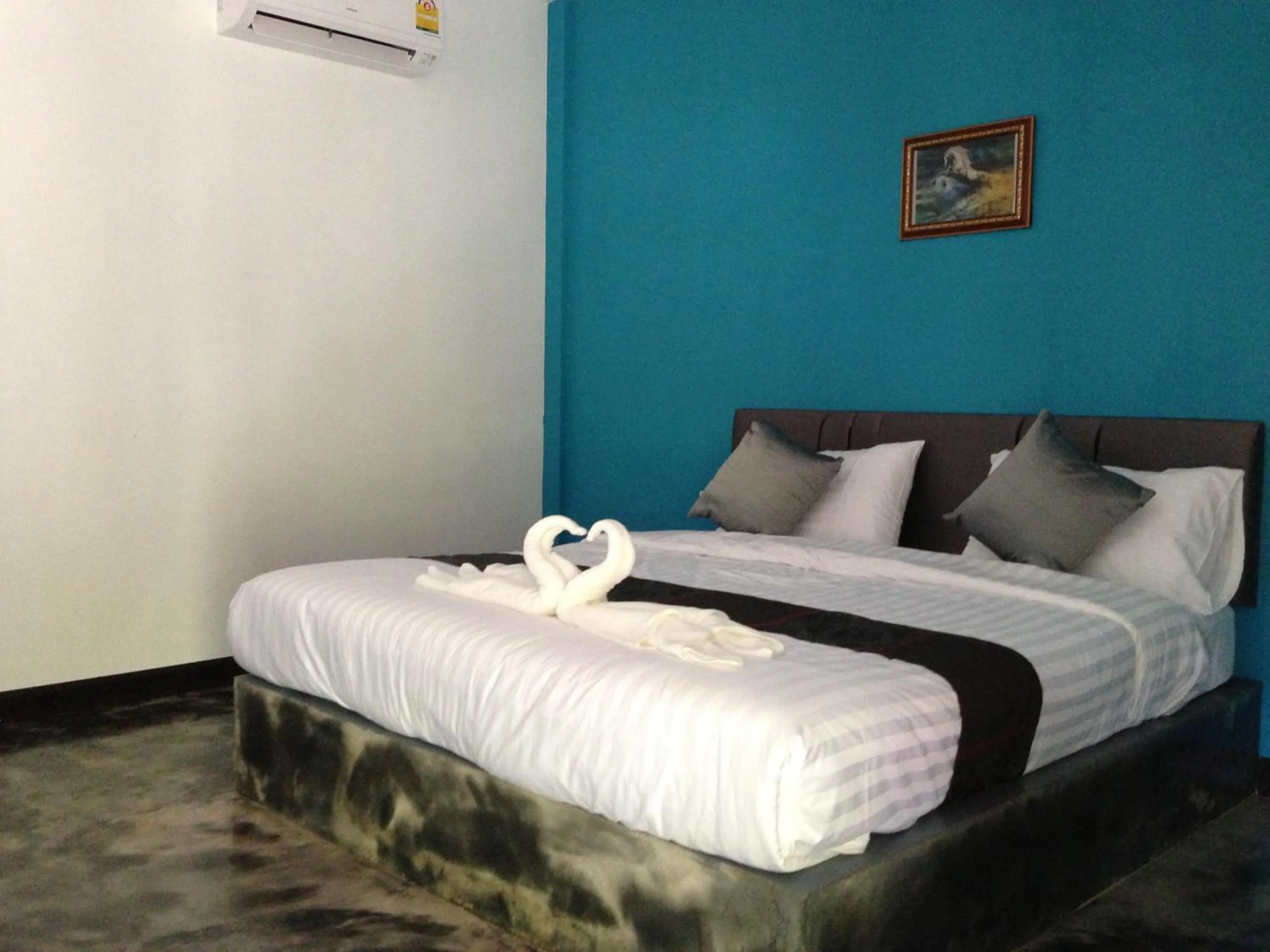 Bed in Baan Rai Phufah Resort Chiangrai