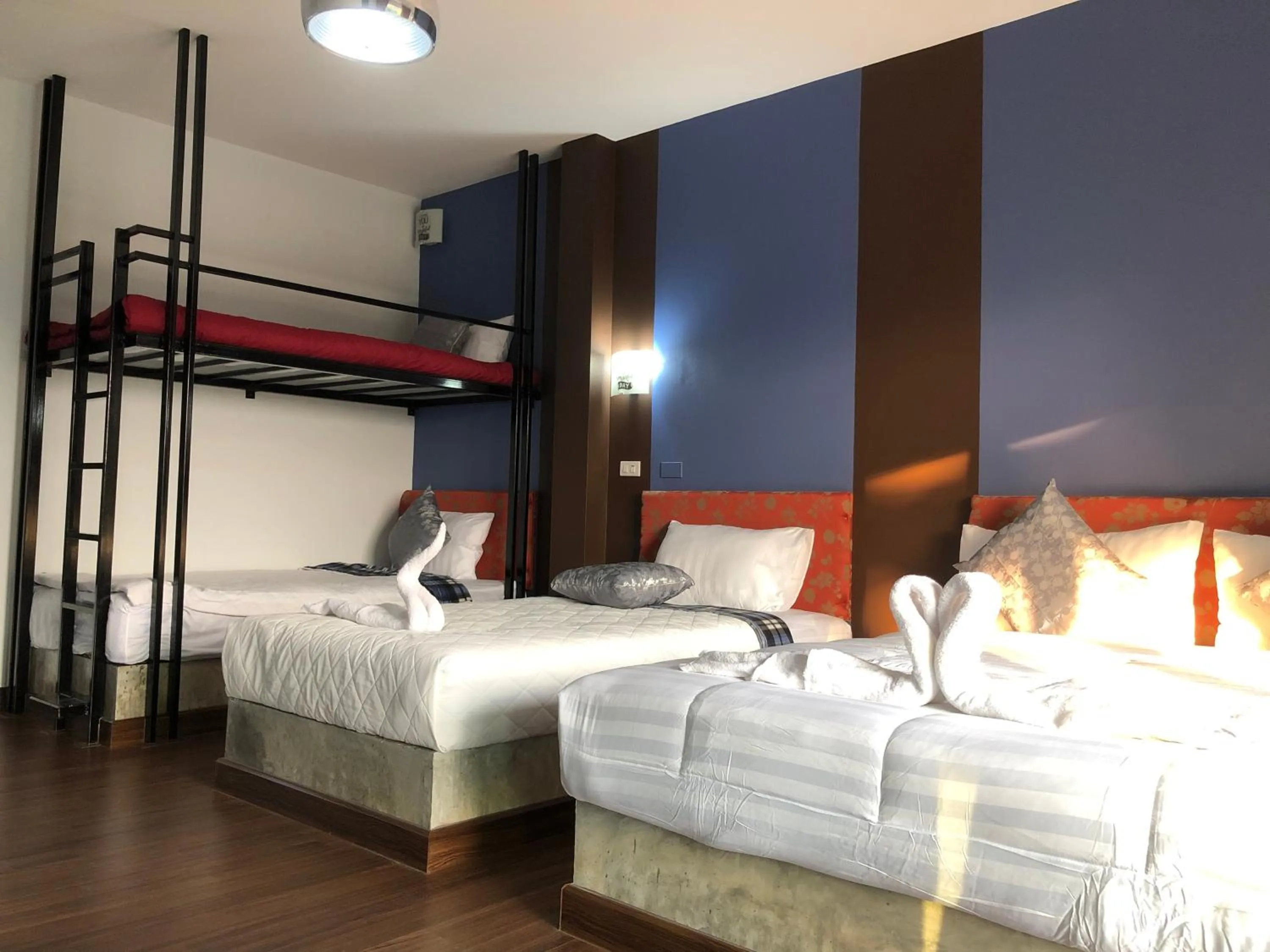 Bed in Baan Rai Phufah Resort Chiangrai