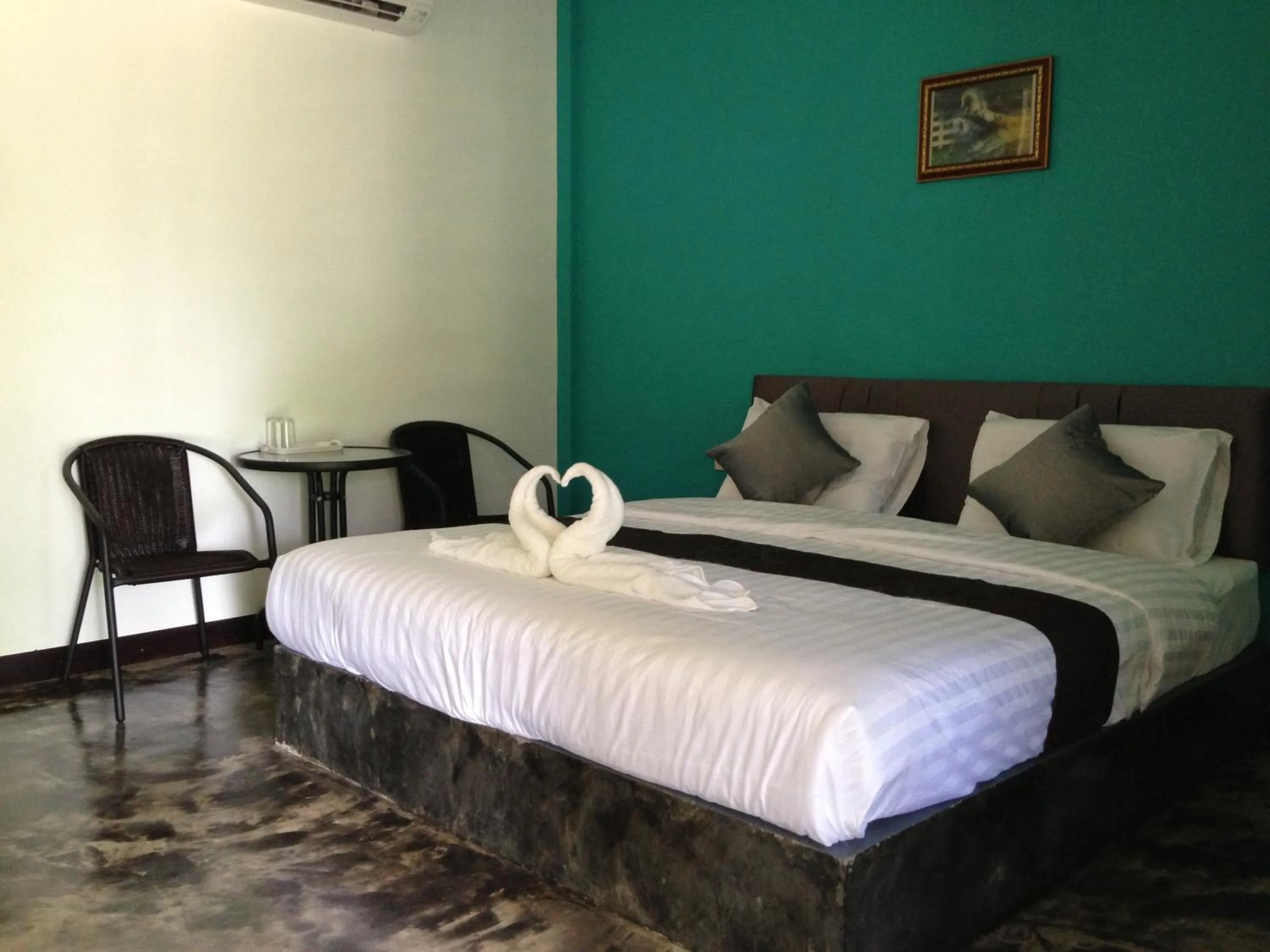 Bed in Baan Rai Phufah Resort Chiangrai