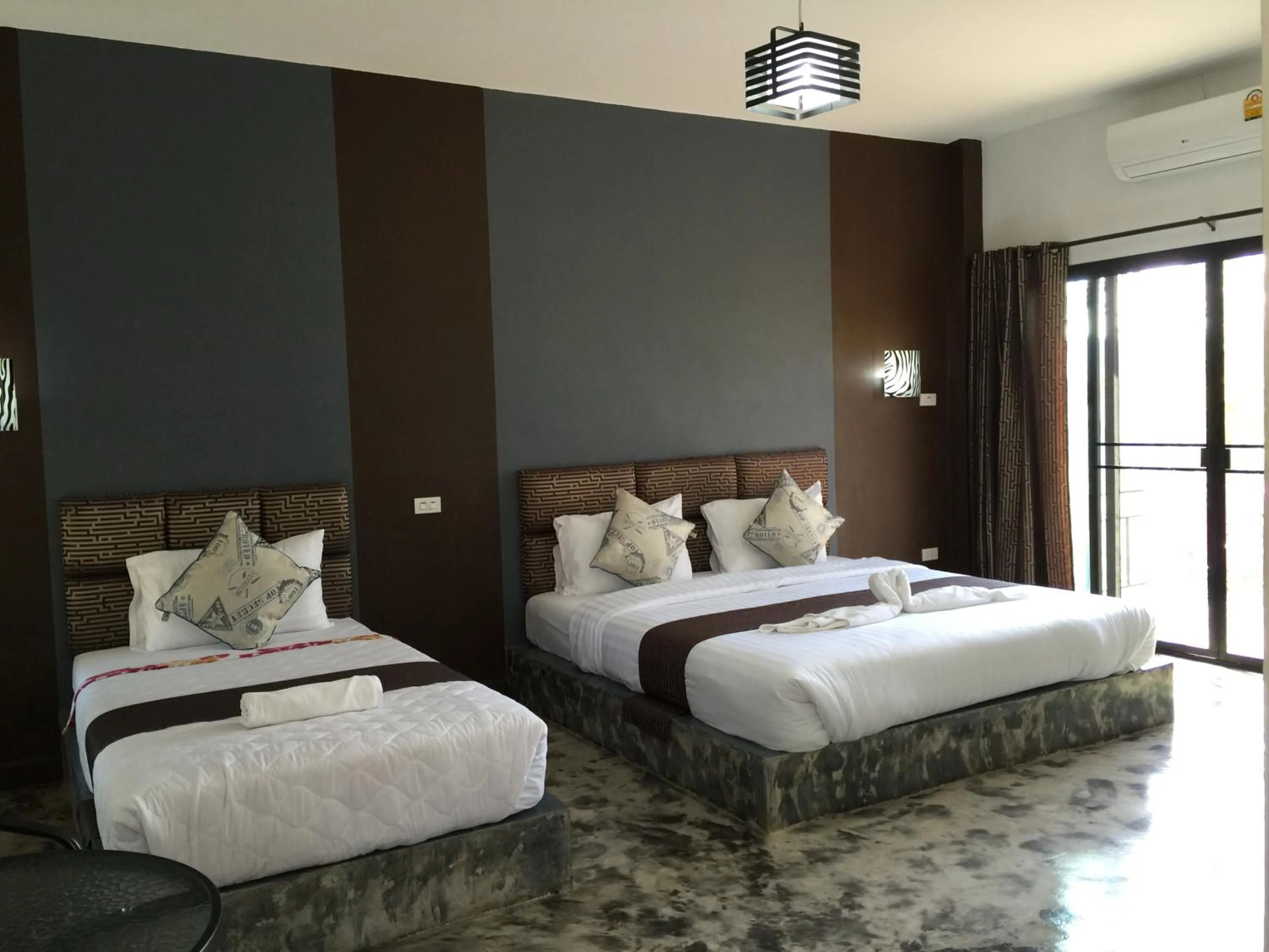 Bed in Baan Rai Phufah Resort Chiangrai