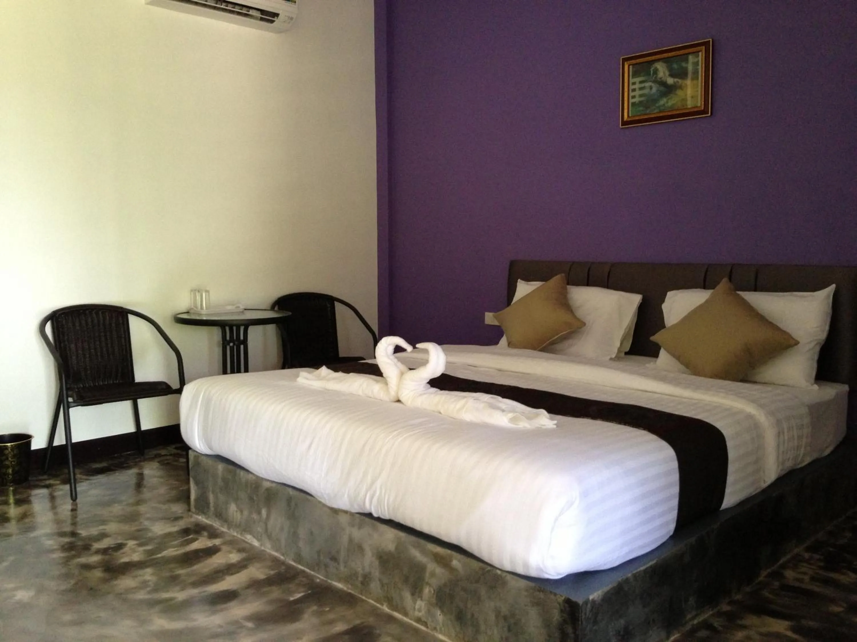 Bed in Baan Rai Phufah Resort Chiangrai