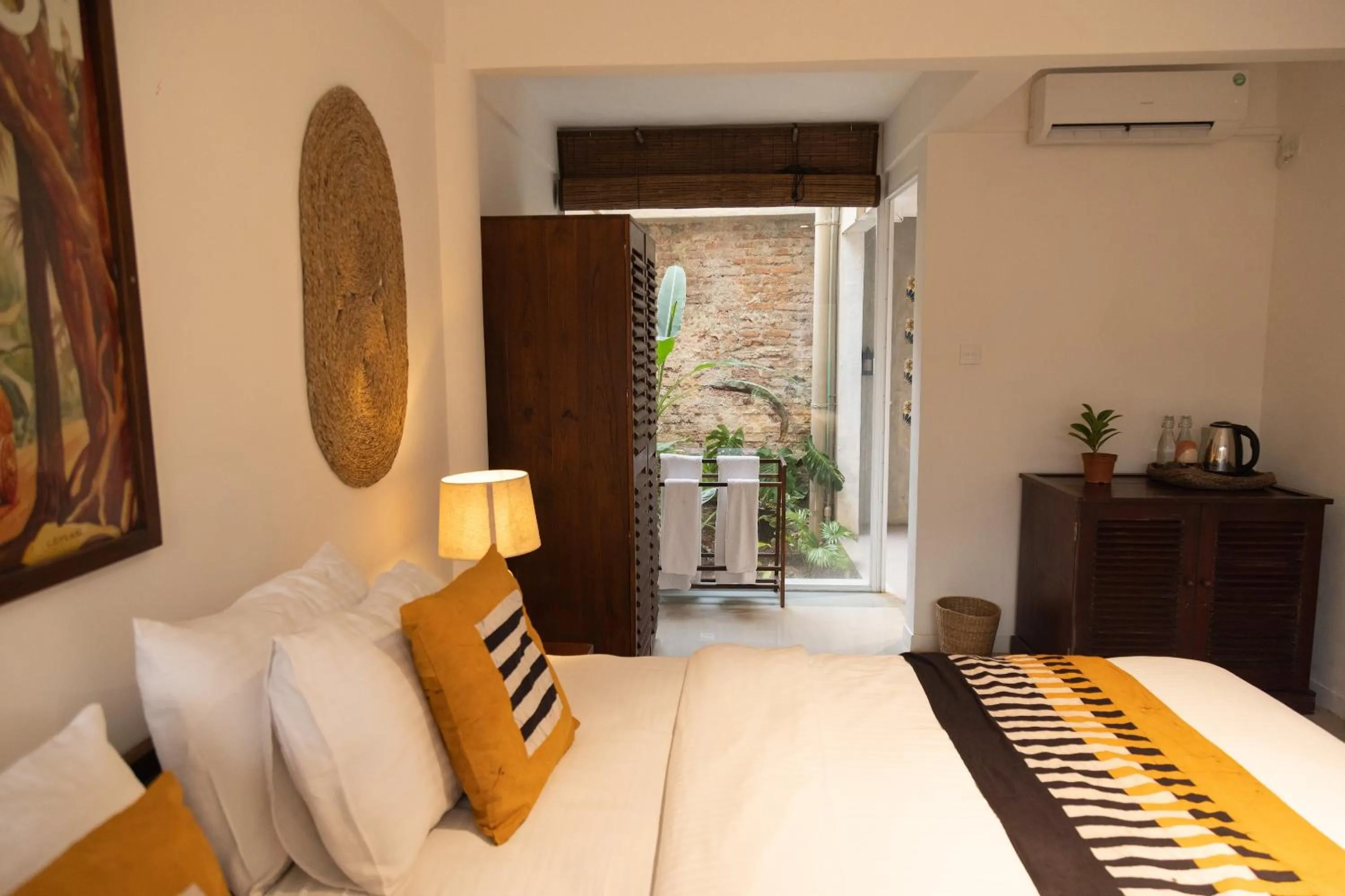 Bed in Neevana Hotel Hikkaduwa