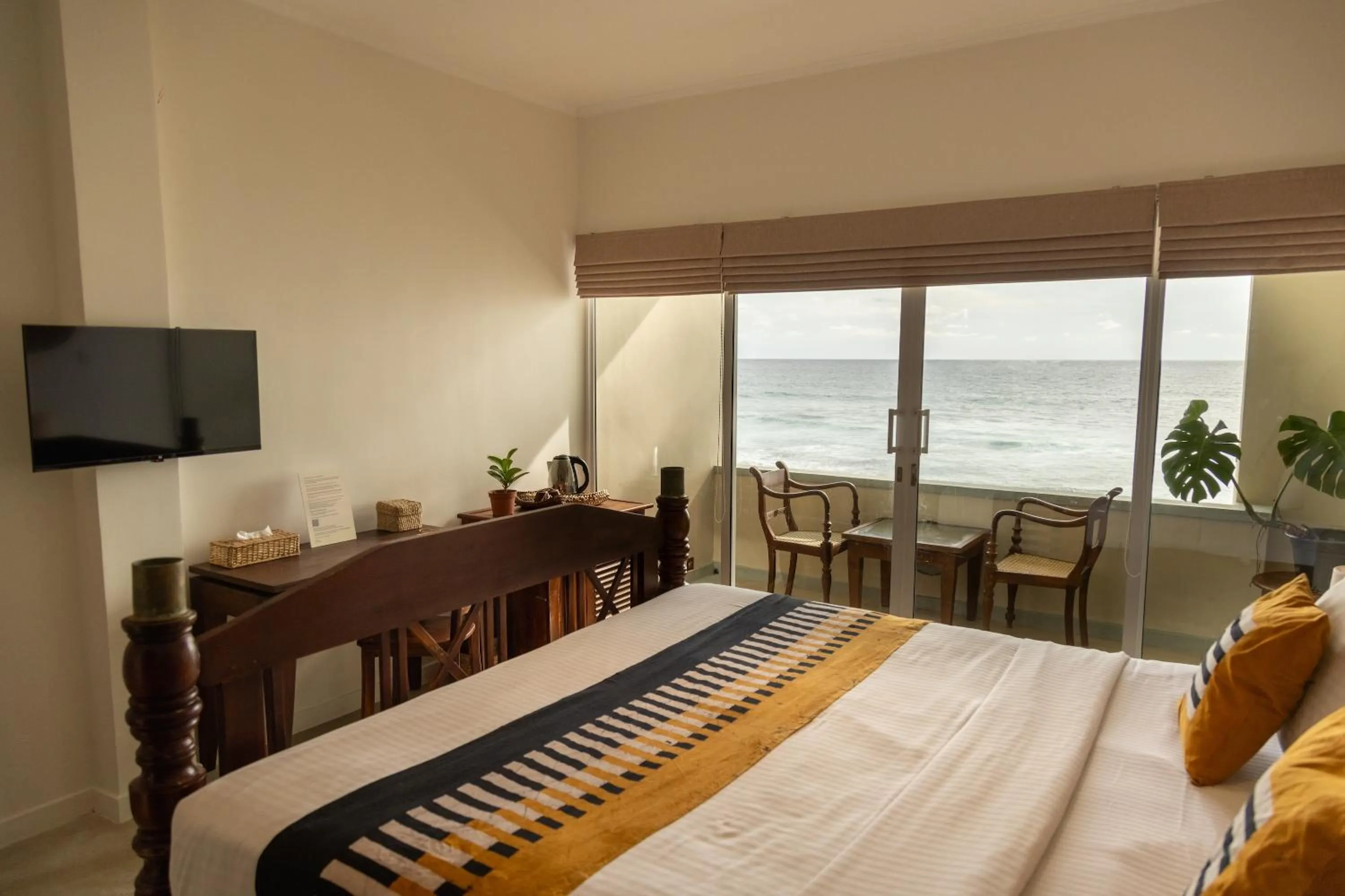 Bed in Neevana Hotel Hikkaduwa