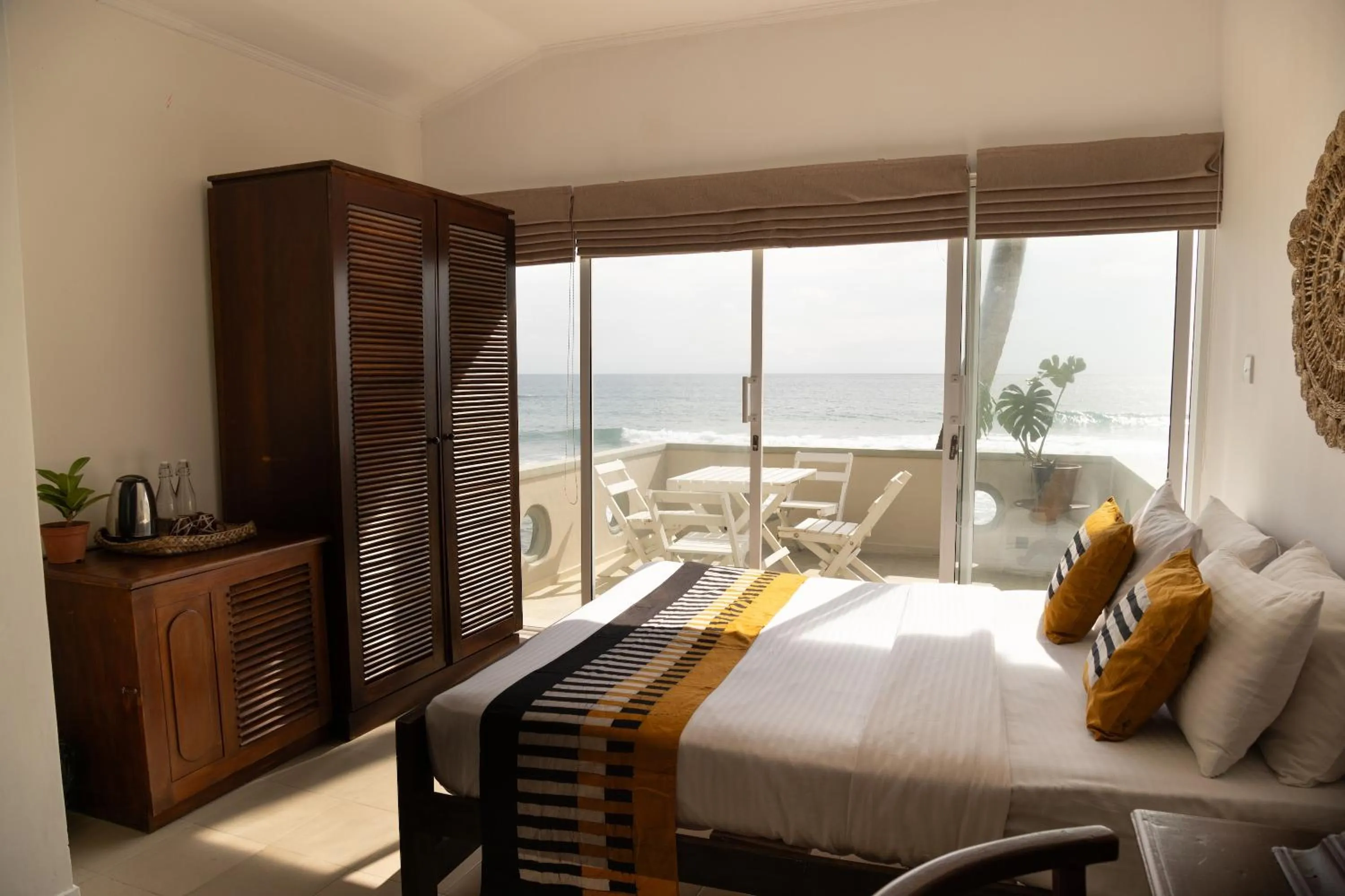 Bed in Neevana Hotel Hikkaduwa