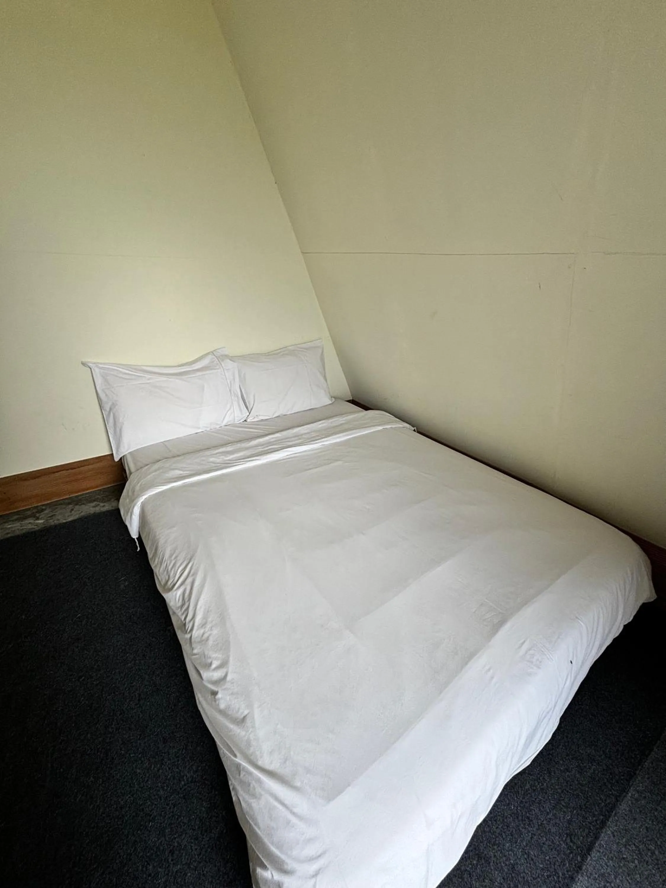 Bed in Double U Camp and Villa