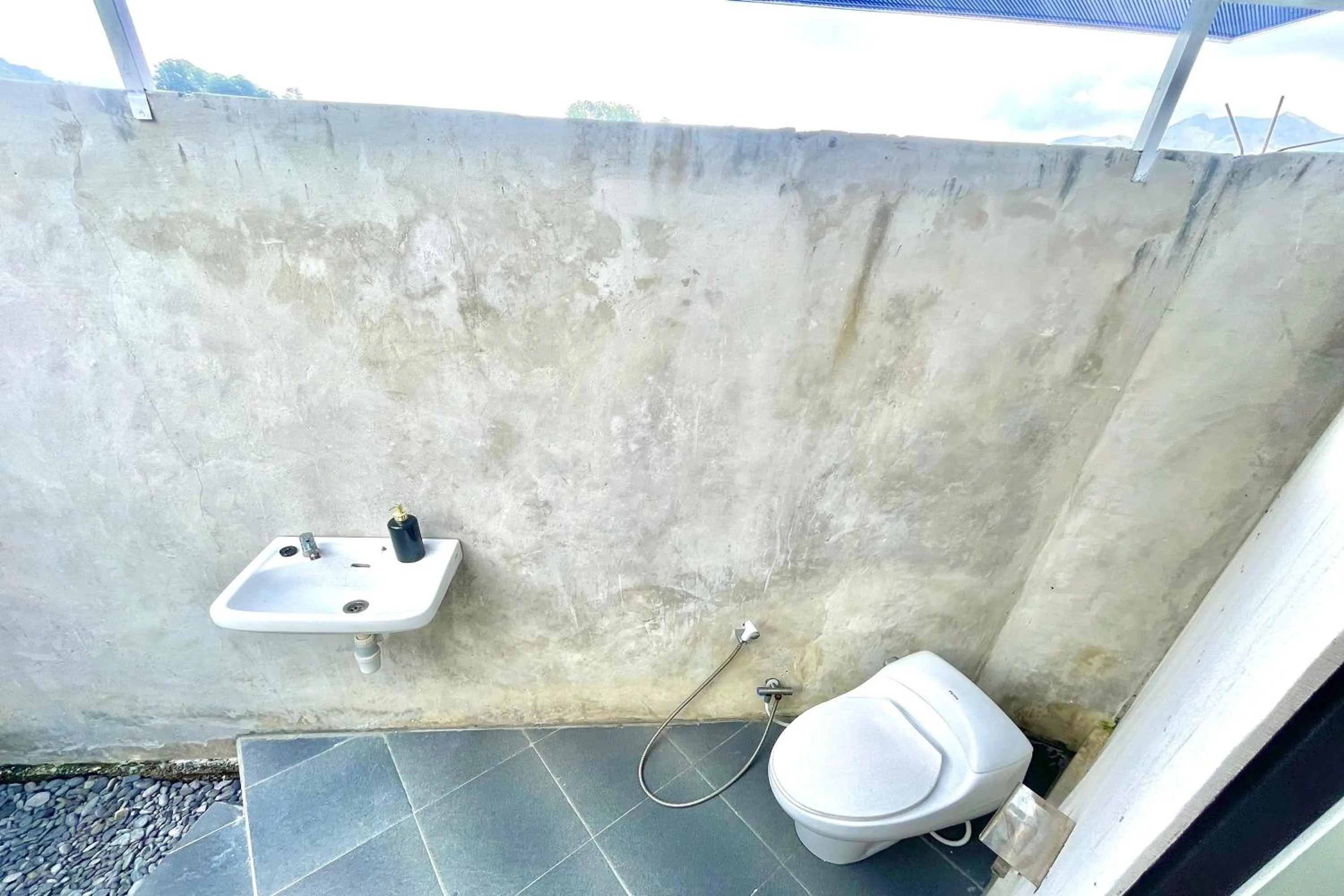 Toilet in Double U Camp and Villa