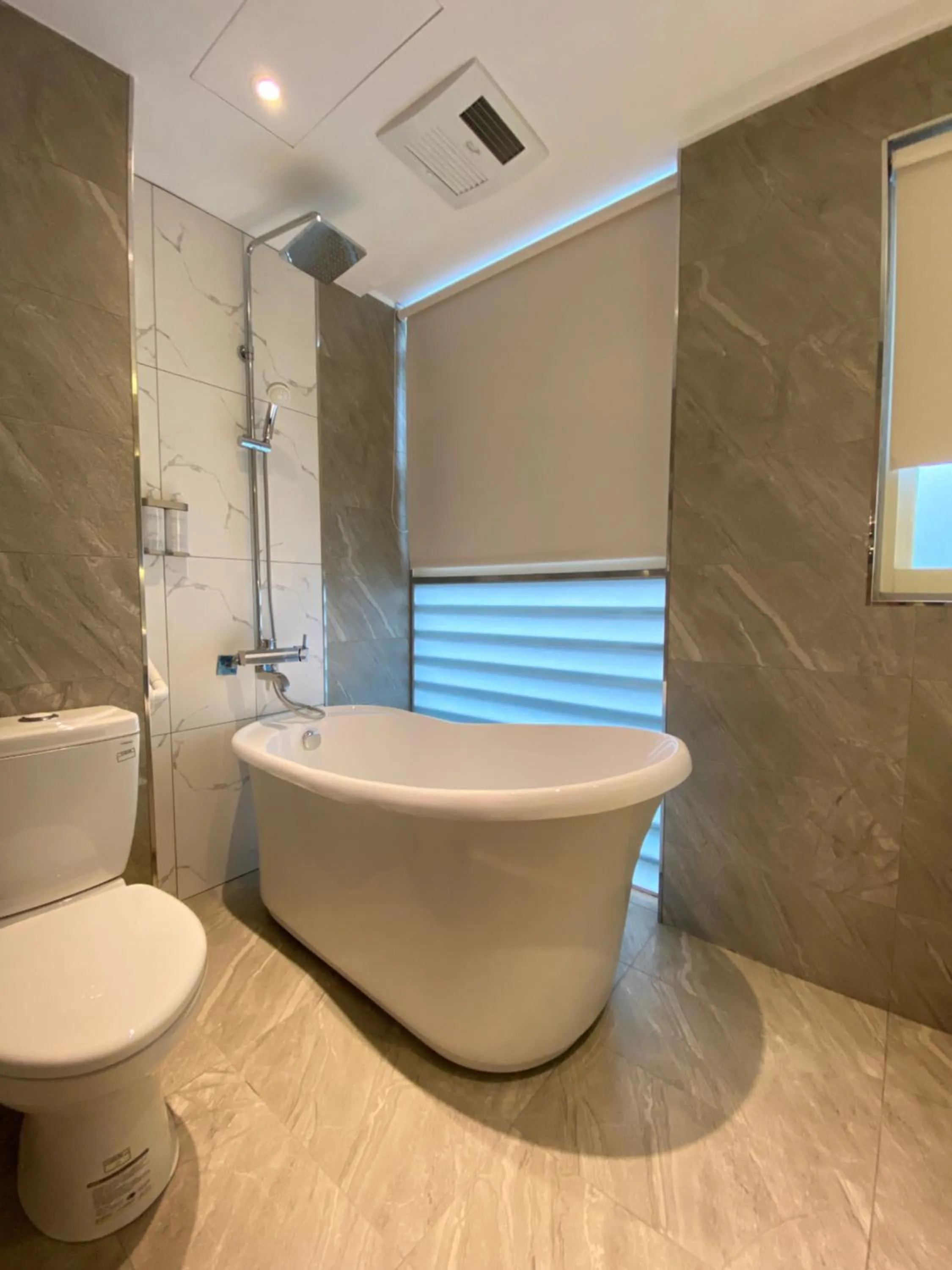 Bathroom in Fashion Home Business Hotel 時尚居商旅