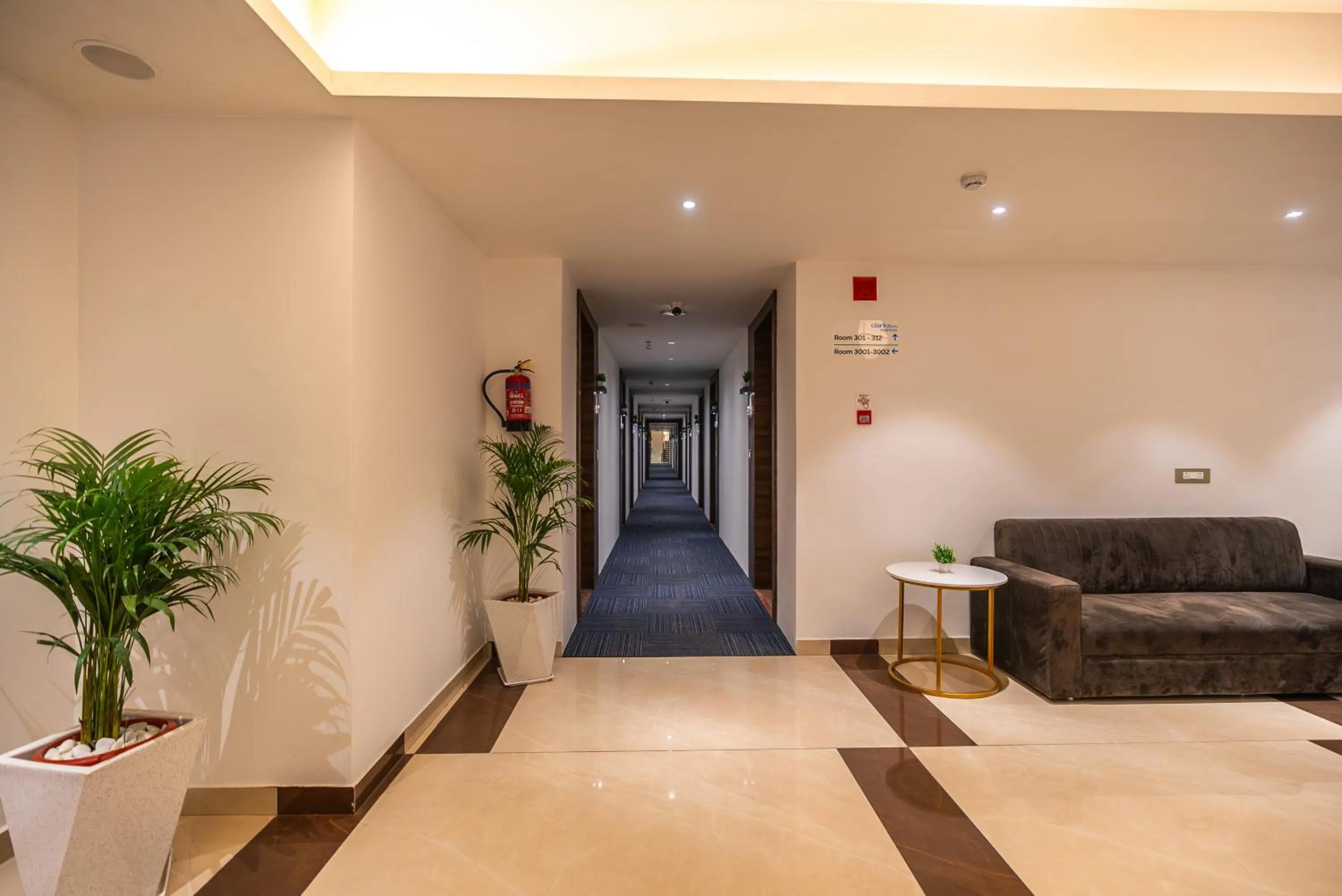 Seating area, Bed in Clarks inn Express Ayodhya