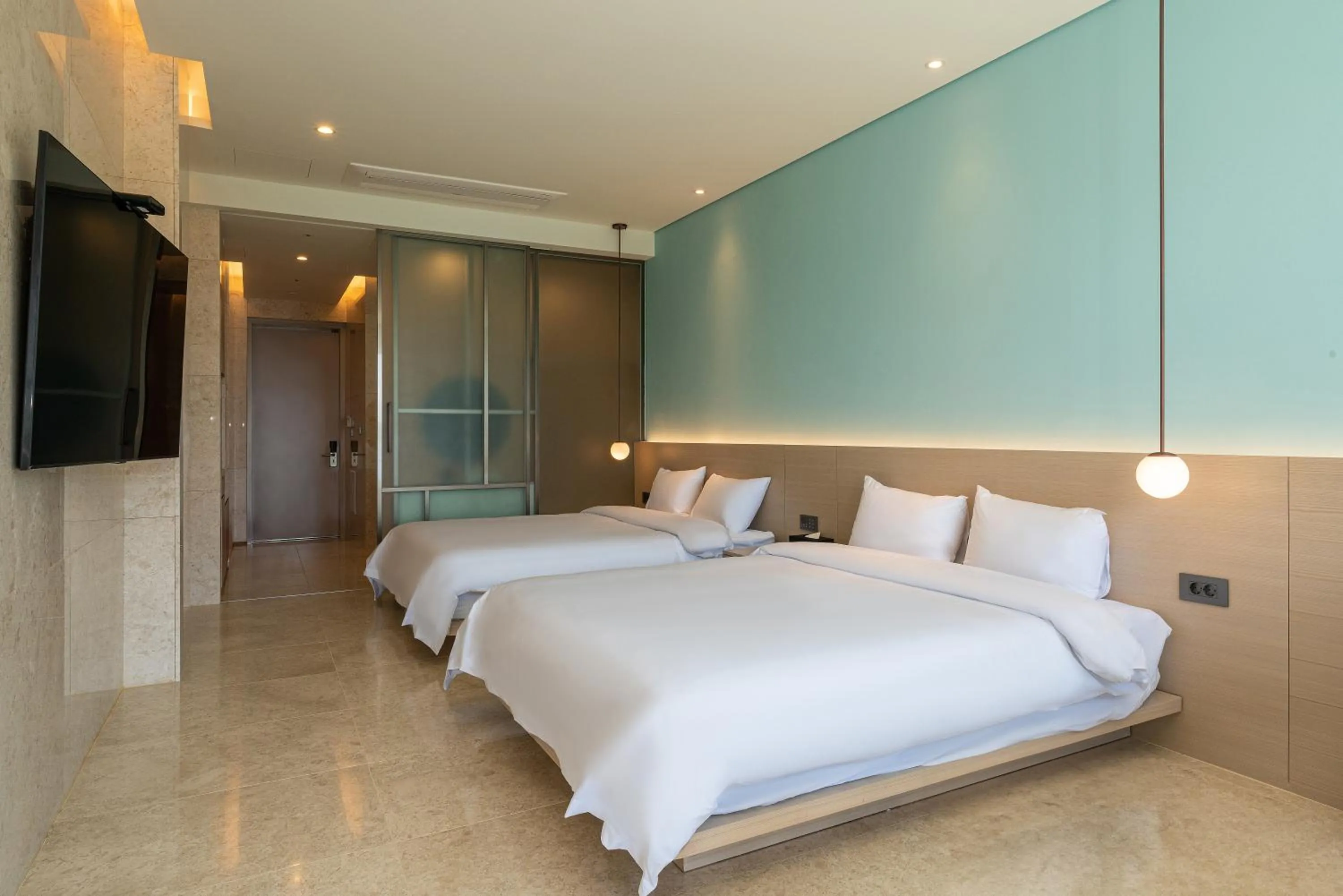 Bed in Yeosu Calacatta Hotel & Resort