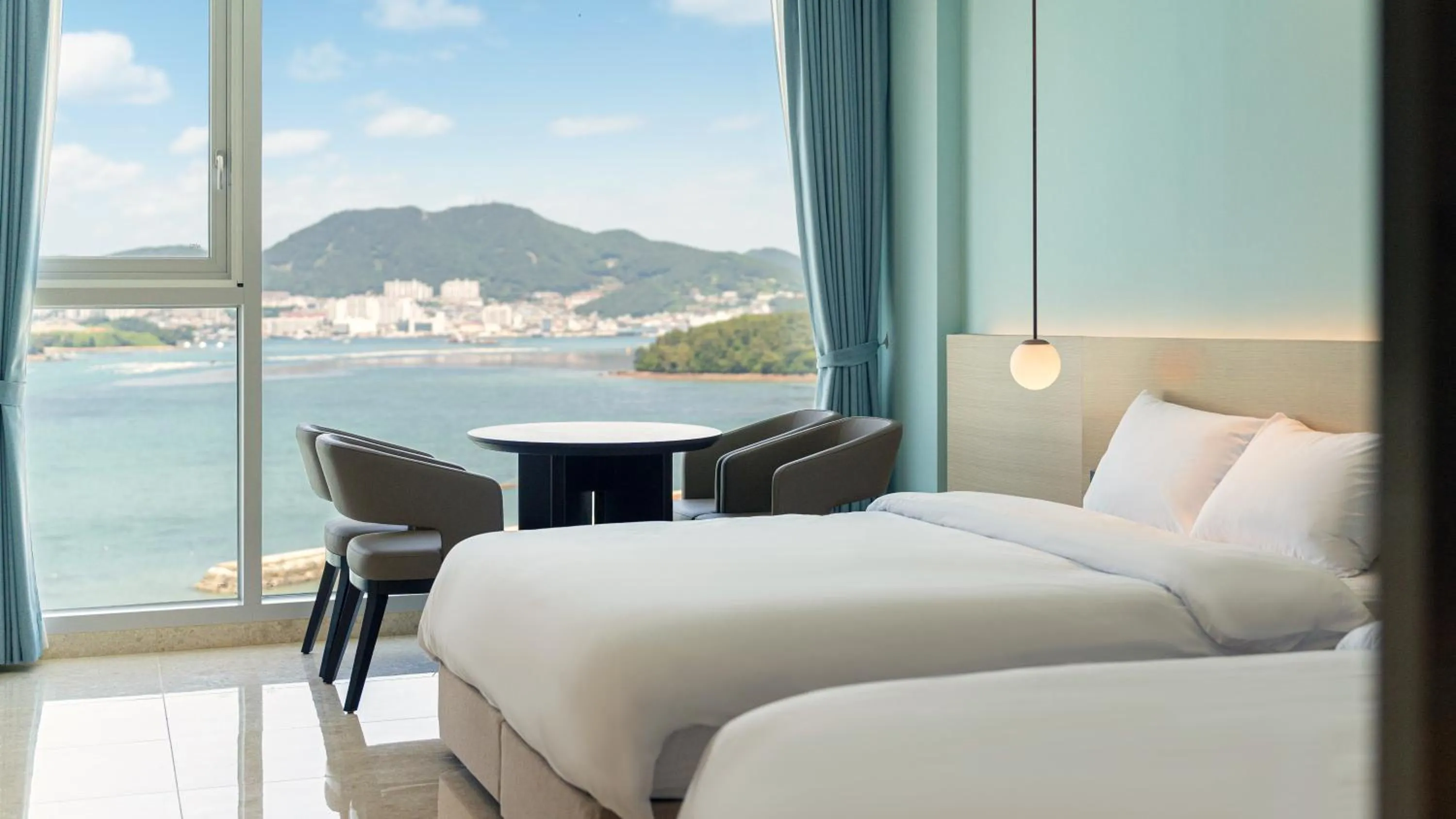Photo of the whole room, Bed in Yeosu Calacatta Hotel & Resort