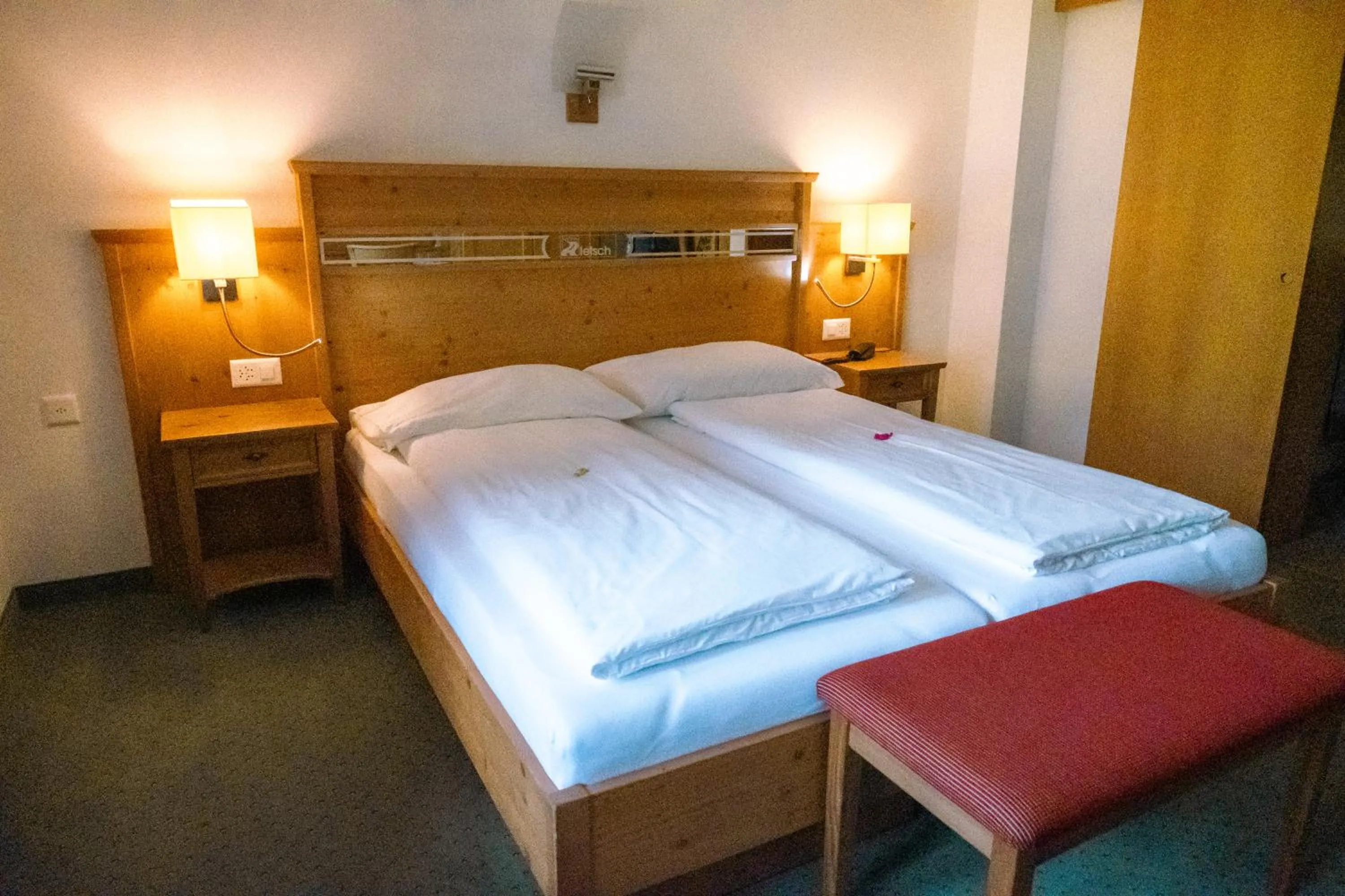 Bed in Hotel Aletsch