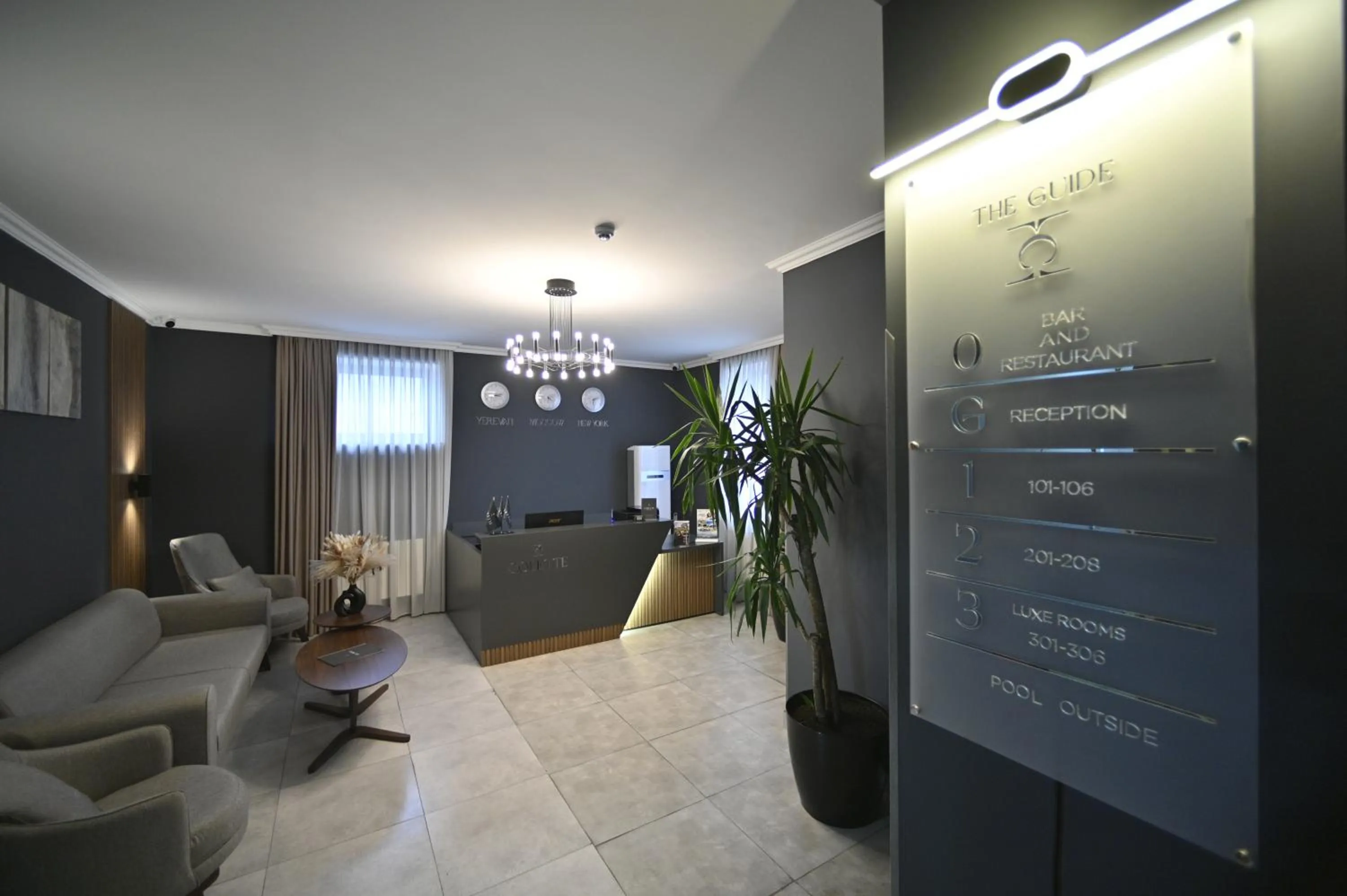 Communal lounge/ TV room in Colette Hotel