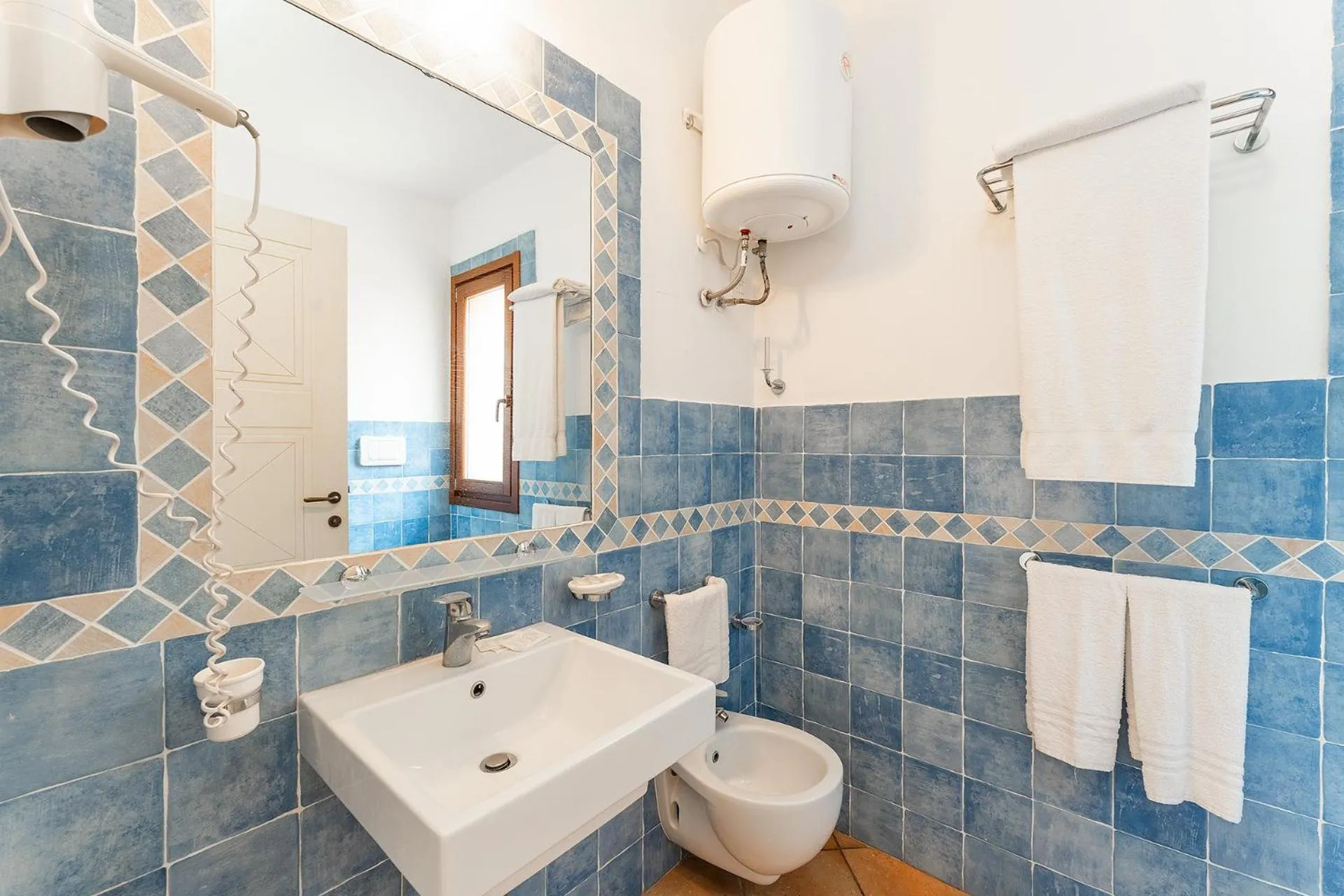 Bathroom in Residence Baia dei Mirti