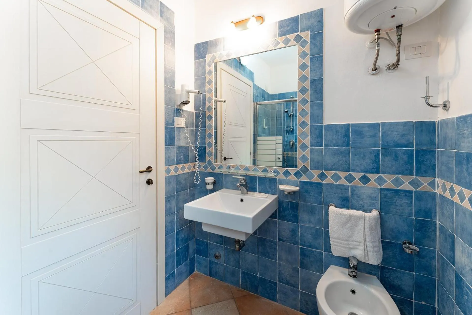 Bathroom in Residence Baia dei Mirti