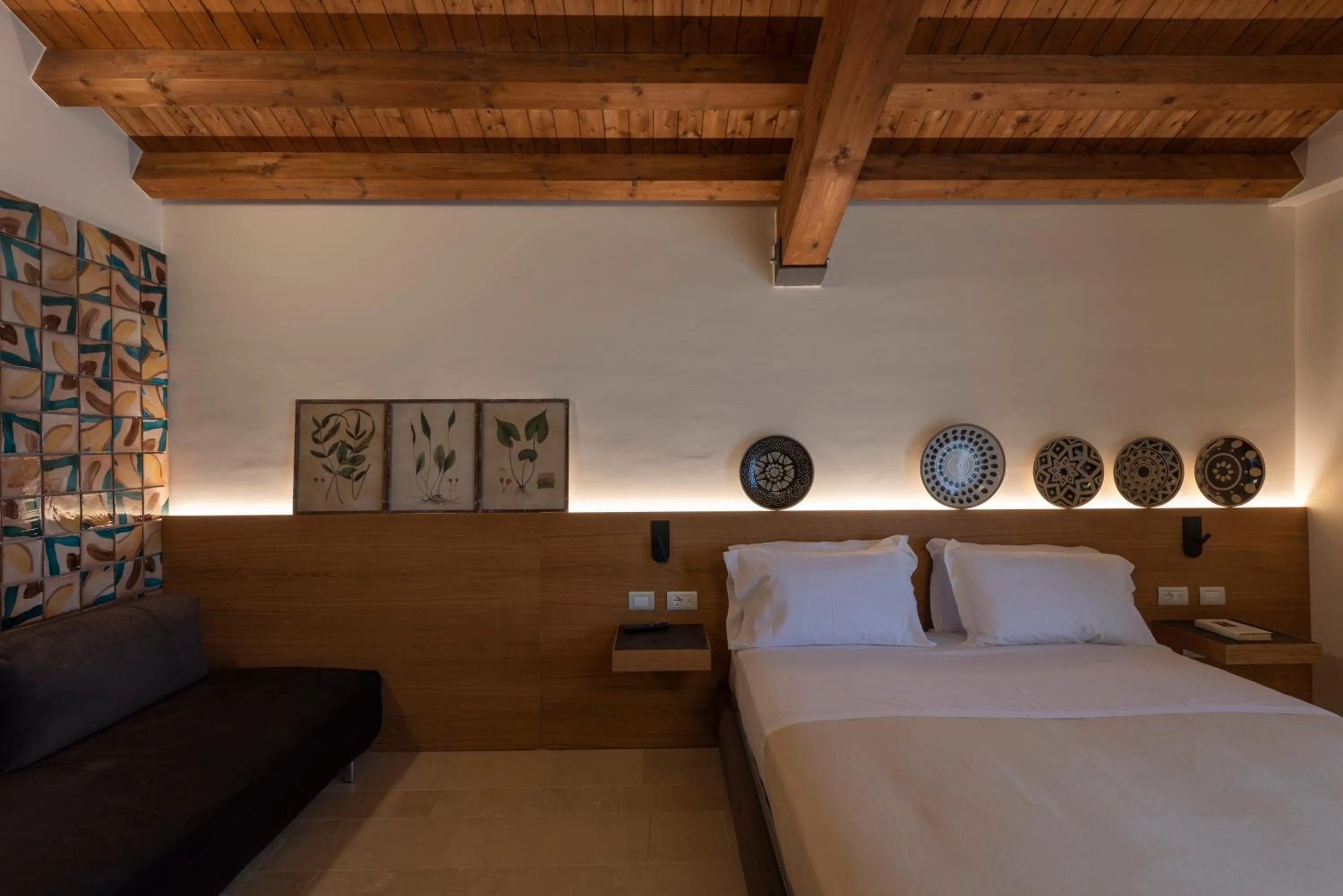 Decorative detail, Bed in Borgo Giallonardo Wine Relais