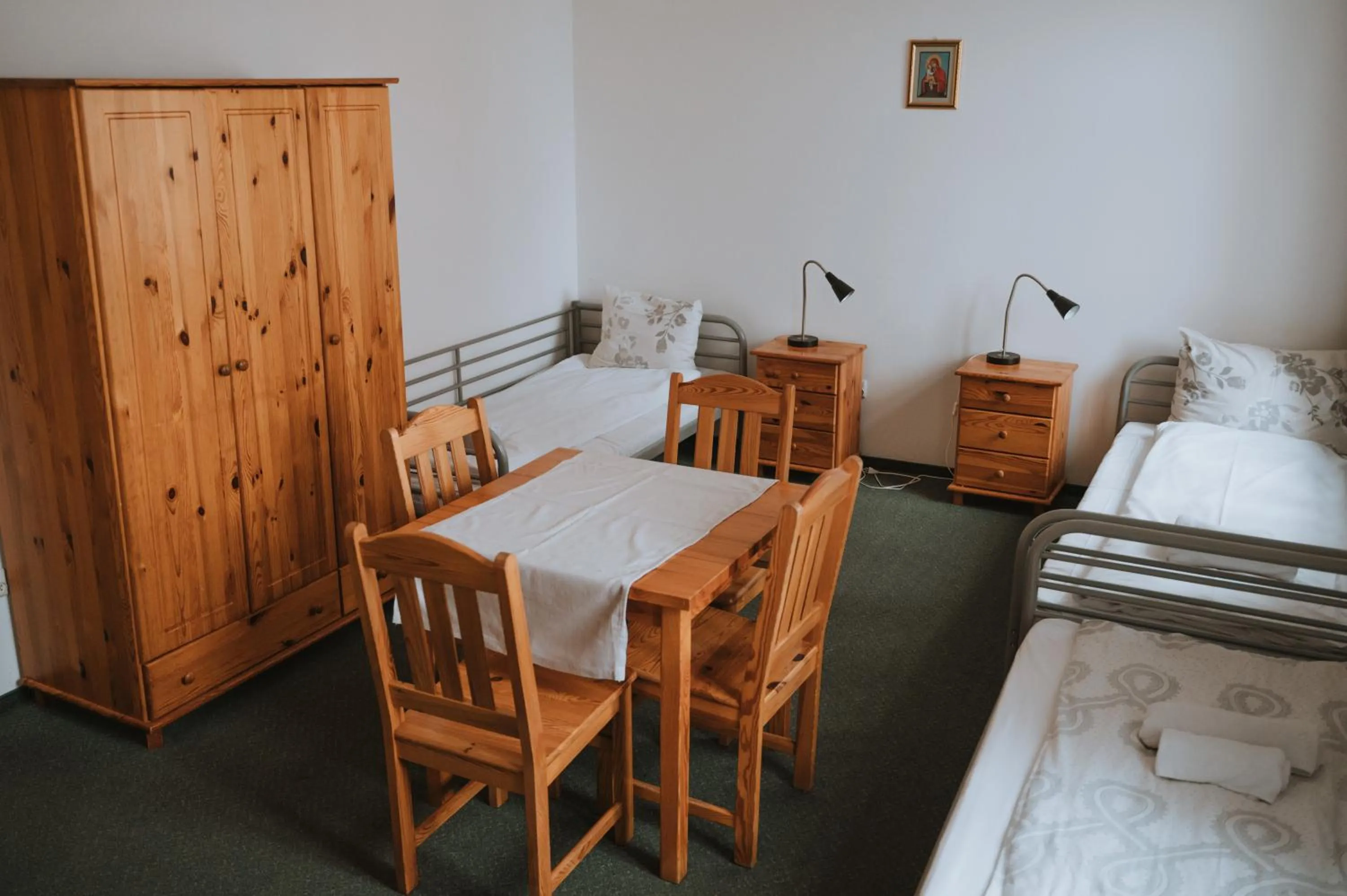 Bed in Pokoje Gościnne Domu Pielgrzyma w Supraślu