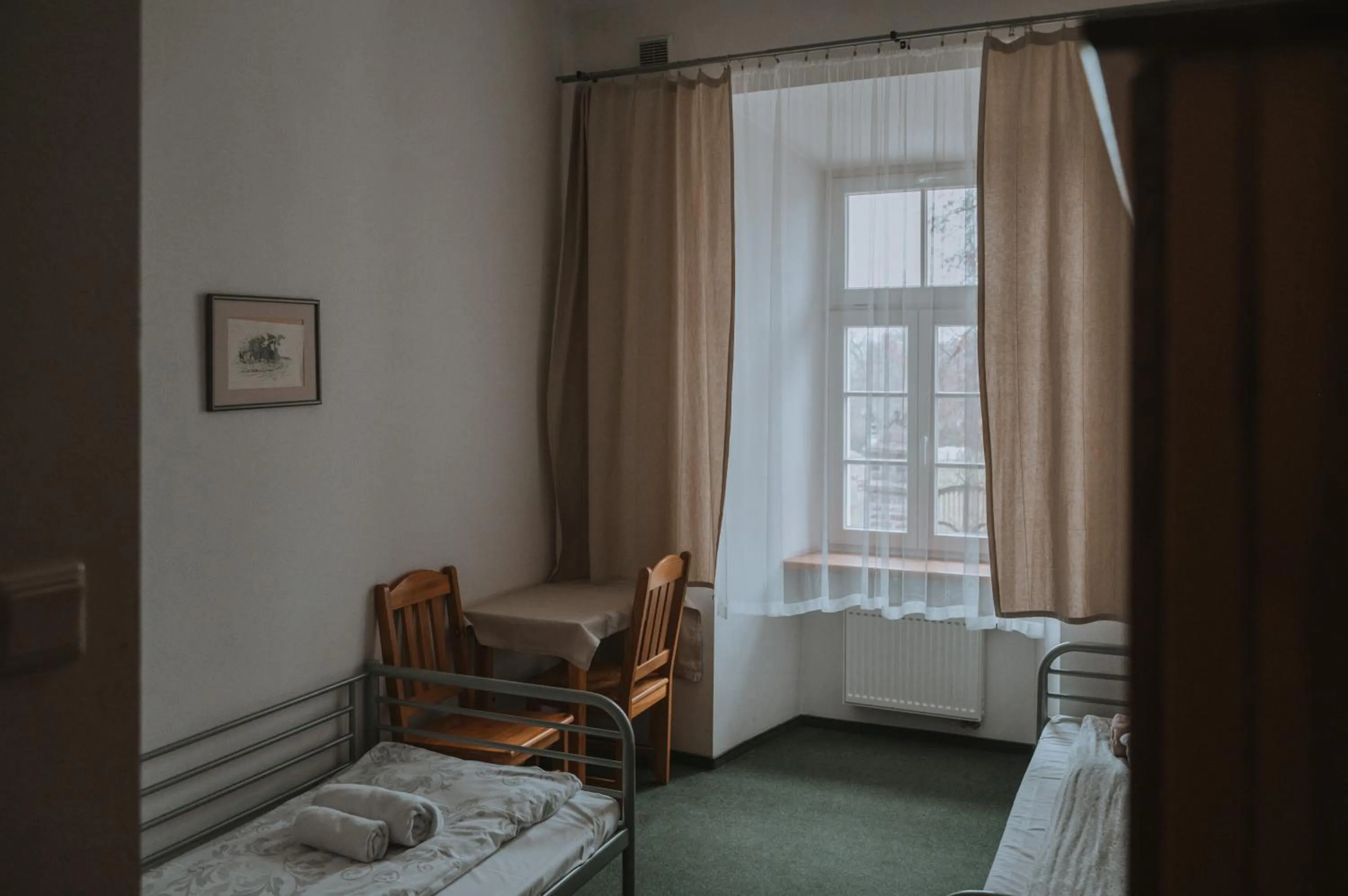 Bed in Pokoje Gościnne Domu Pielgrzyma w Supraślu