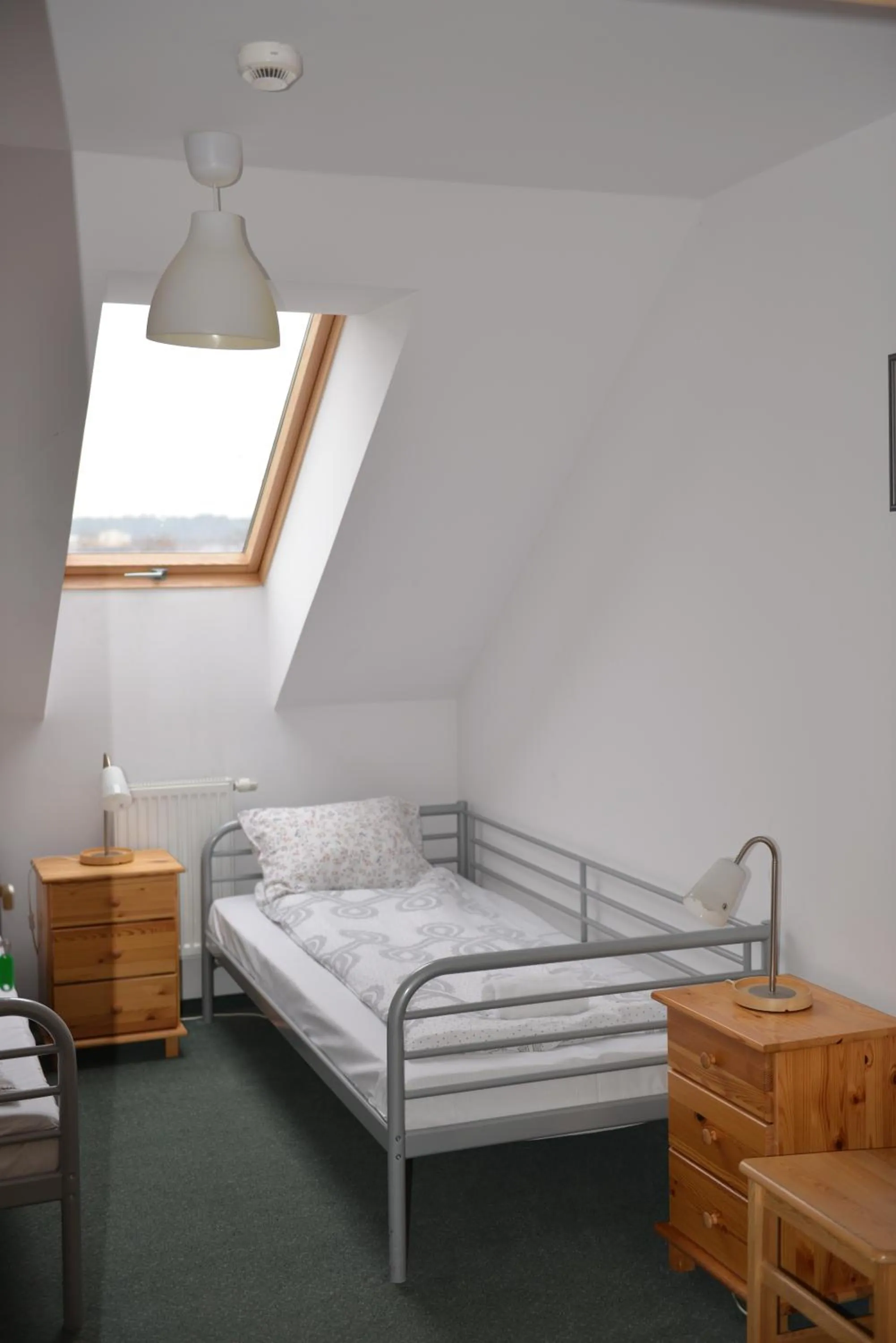 Bed in Pokoje Gościnne Domu Pielgrzyma w Supraślu