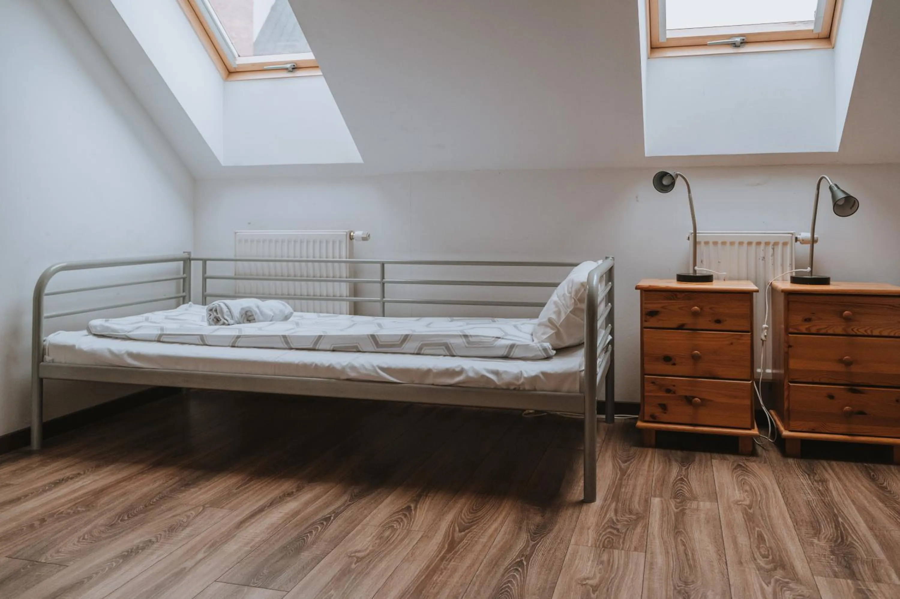 Bed in Pokoje Gościnne Domu Pielgrzyma w Supraślu