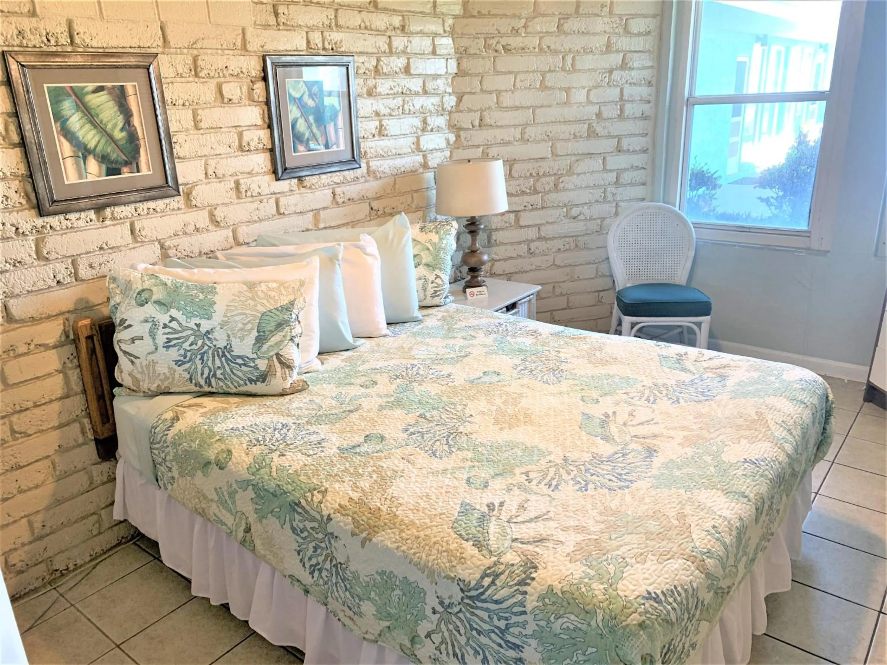 Bed in Sea Aire Oceanfront Inn