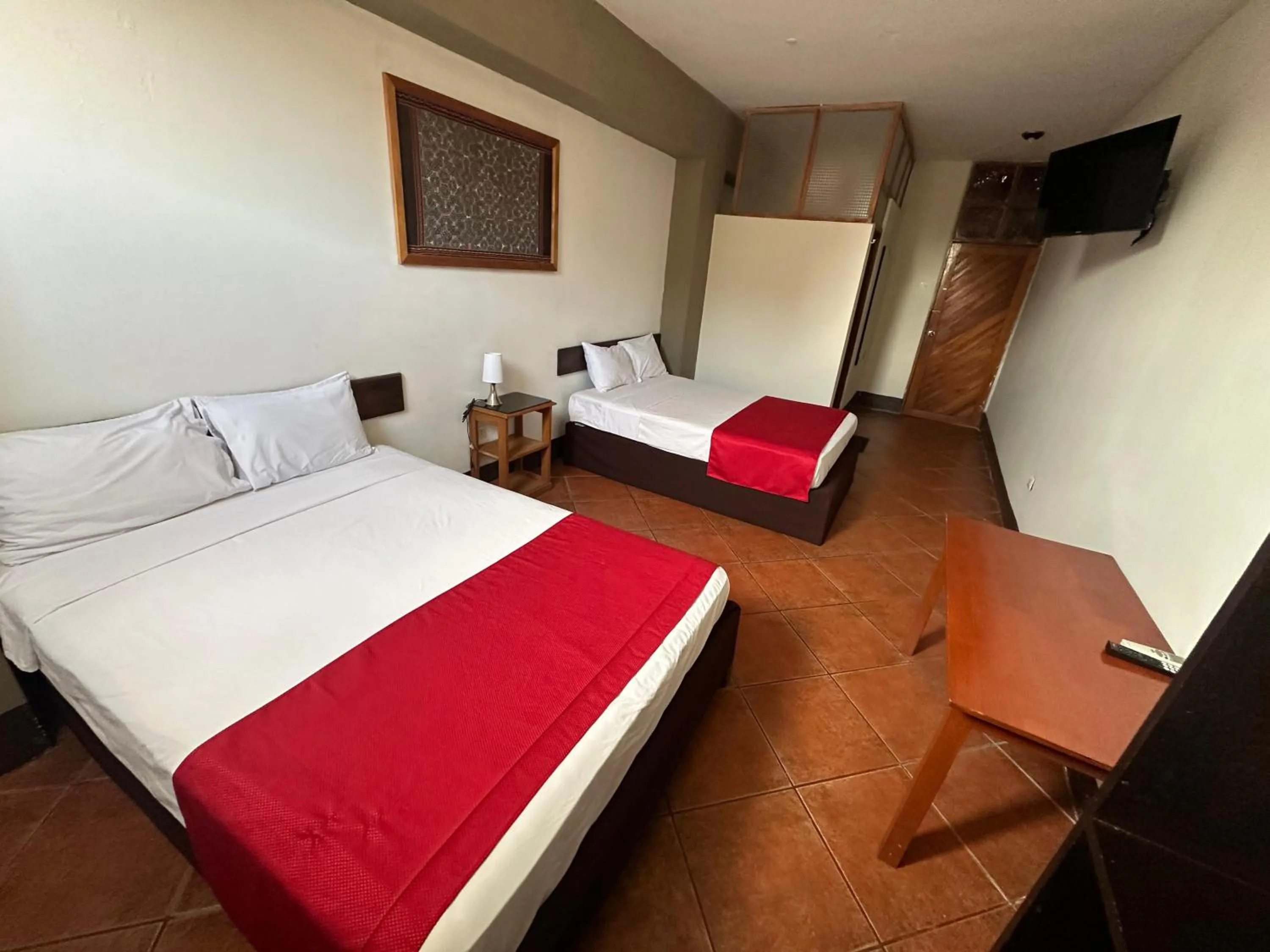 Photo of the whole room, Bed in La Posada del Cauchero Hotel & Suites