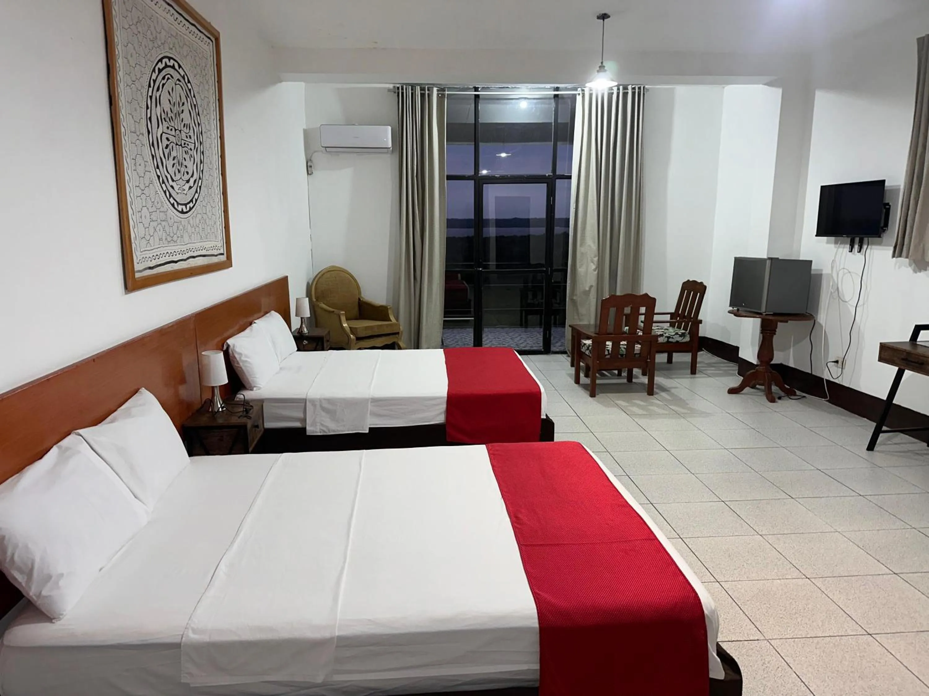 Photo of the whole room, Bed in La Posada del Cauchero Hotel & Suites