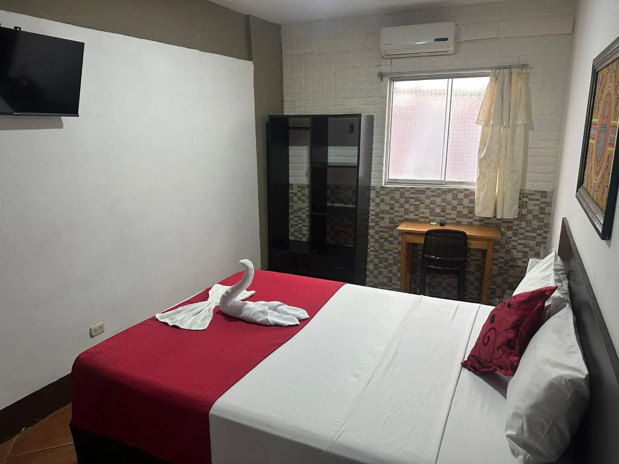 Bedroom, Bed in La Posada del Cauchero Hotel & Suites