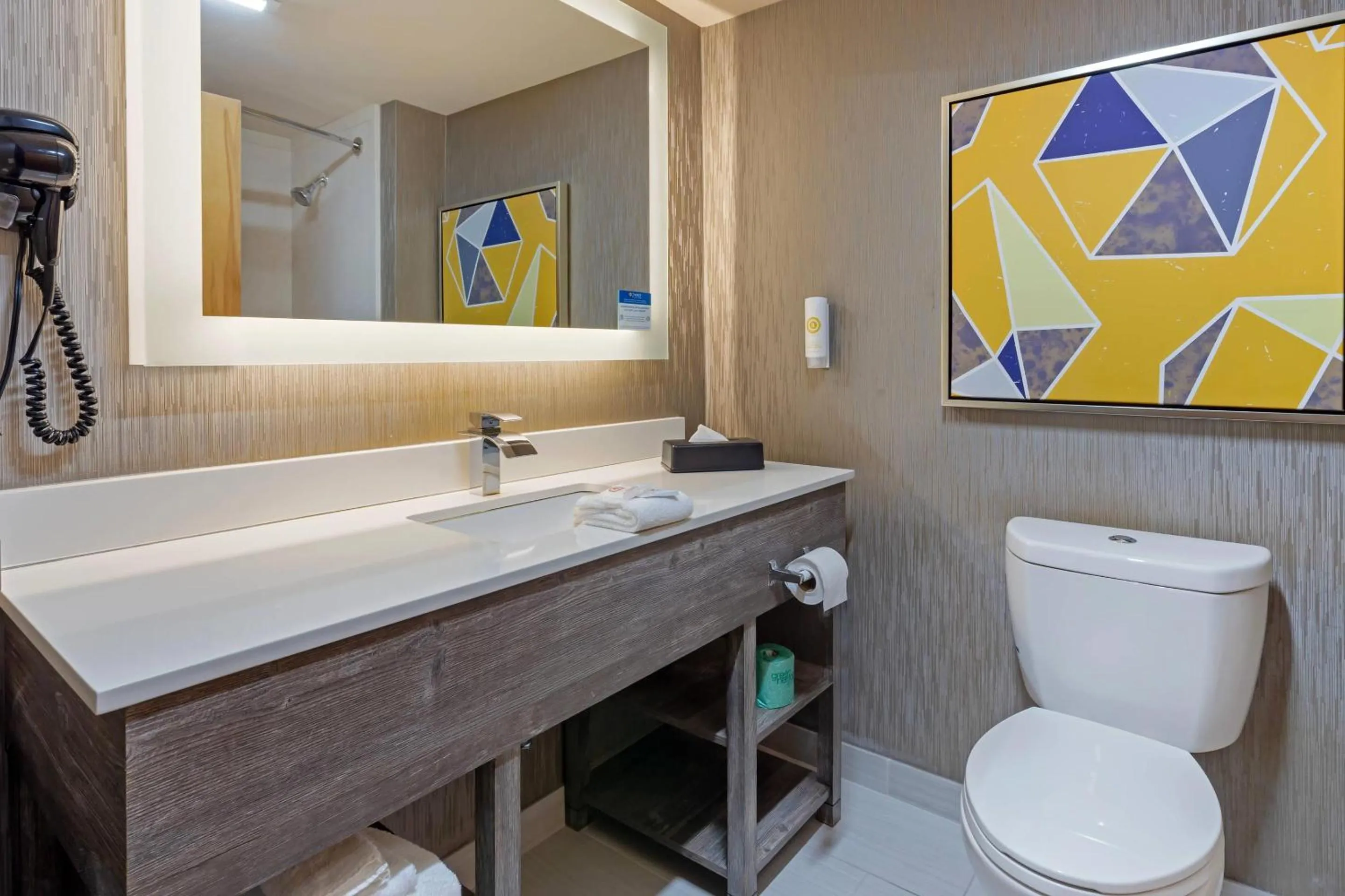 Bedroom in Comfort Inn & Suites Greenville Near East Carolina University